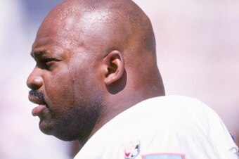 24 Sep 1995:  Defensive lineman Michael Dean Perry of the Denver Broncos looks on during a game against the San Diego Chargers at Jack Murphy Stadium in San Diego, California.  The Chargers won the game, 17-6. Mandatory Credit: Jed Jacobsohn  /Allsport