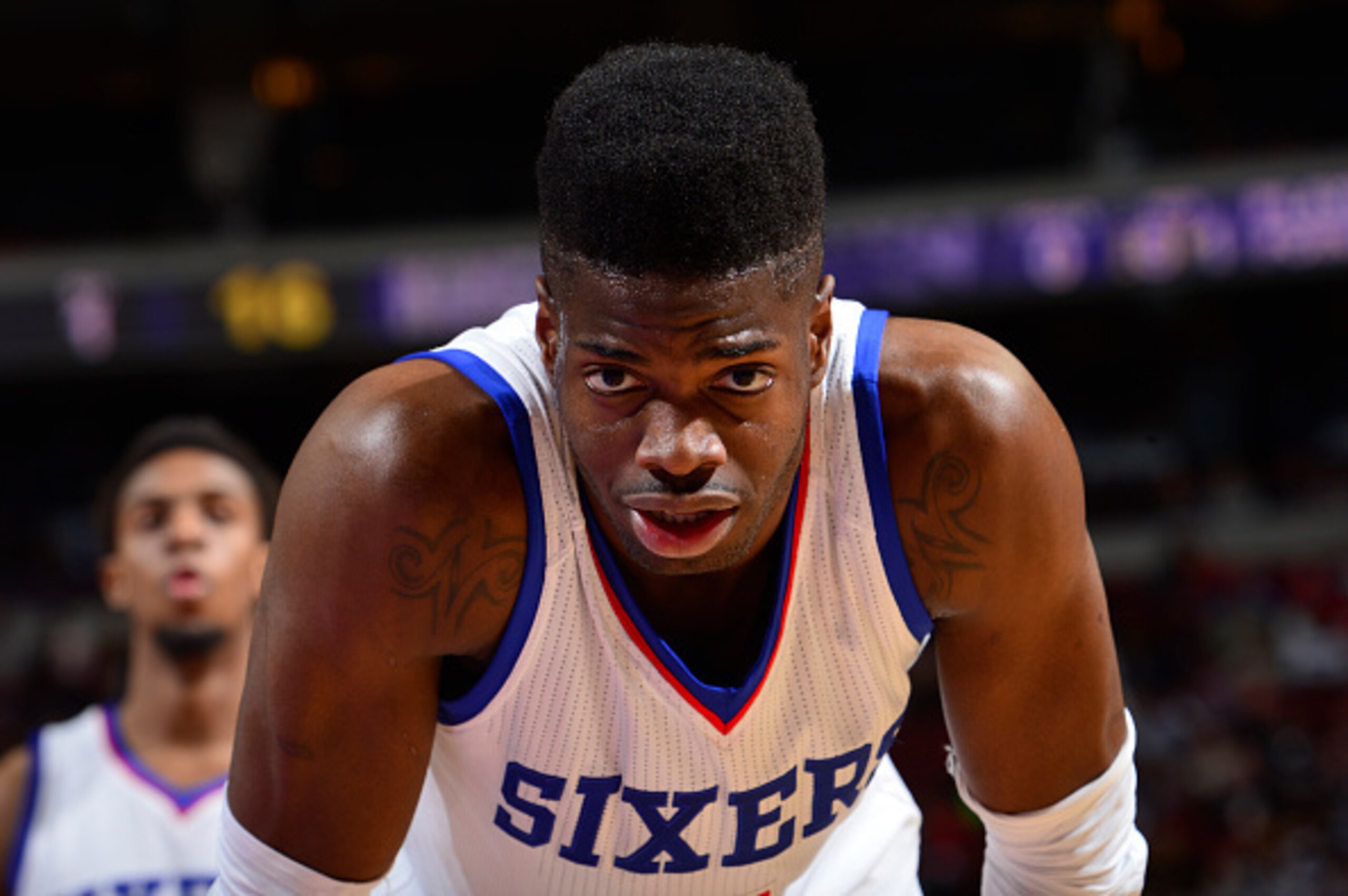 PHILADELPHIA - MARCH 13:  Nerlens Noel #4 of the Philadelphia 76ers looks into the camera against the Sacramento Kings at the Wells Fargo Center on March 13, 2015 in Philadelphia, Pennsylvania. NOTE TO USER: User expressly acknowledges and agrees that, by