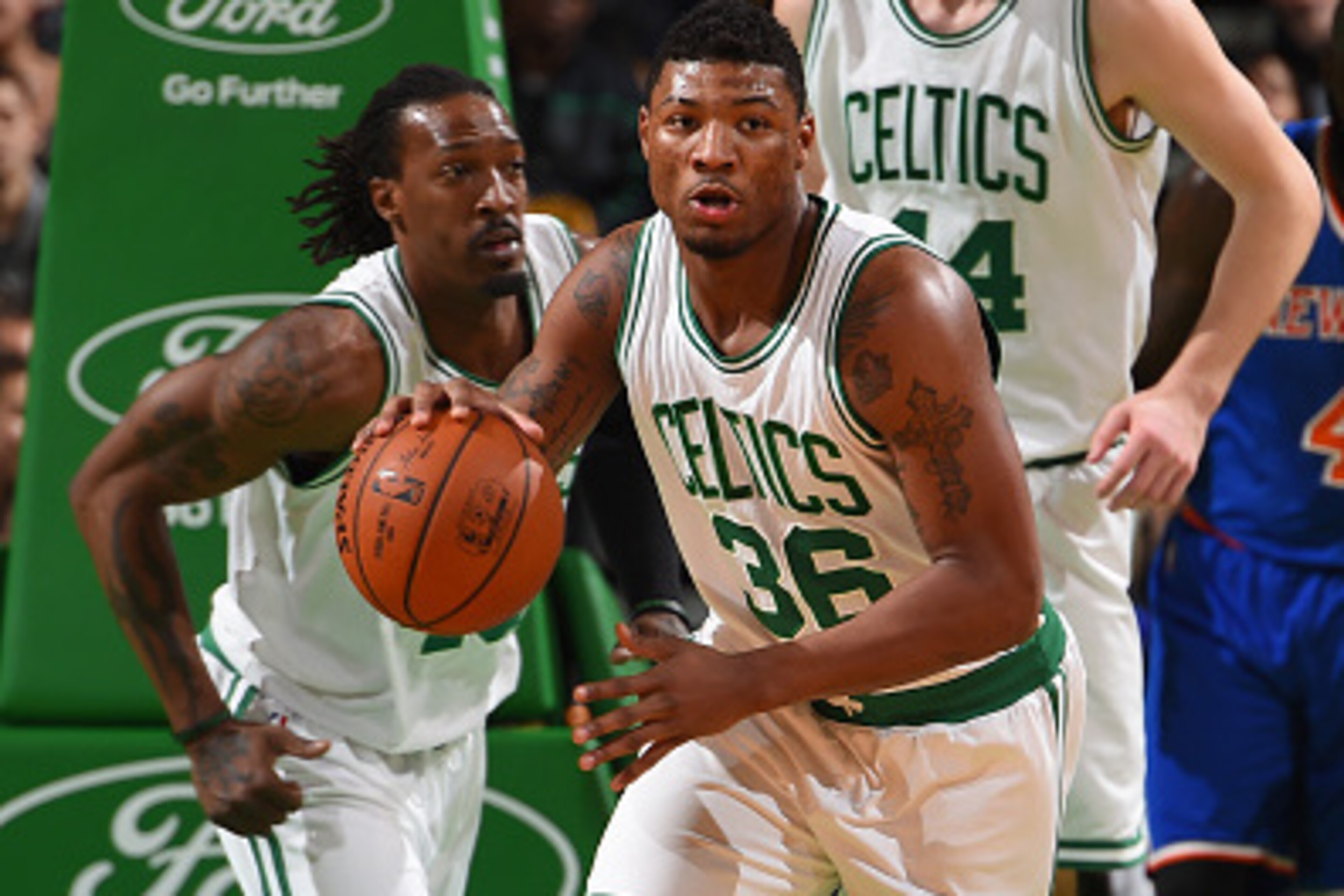 BOSTON, MA - FEBRUARY 25:  Marcus Smart #36 of the Boston Celtics brings the ball up court against the New York Knicks on February 25, 2015 at TD Garden in Boston, Massachusetts.  NOTE TO USER: User expressly acknowledges and agrees that, by downloading a