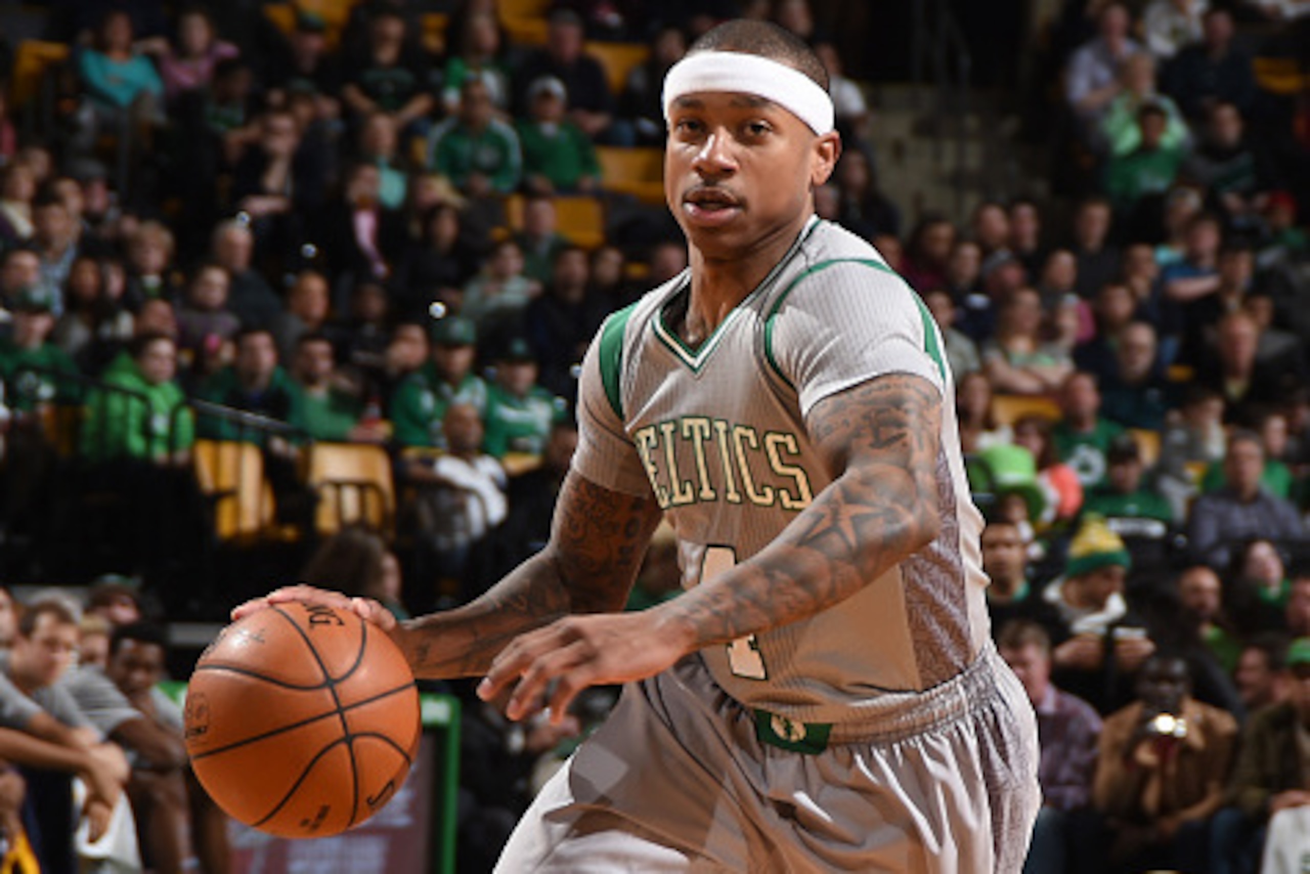 BOSTON, MA - MARCH 4:  Isaiah Thomas #4 of the Boston Celtics handles the ball against the Utah Jazz on March 4, 2015 at TD Garden in Boston, Massachusetts.  NOTE TO USER: User expressly acknowledges and agrees that, by downloading and or using this Photo