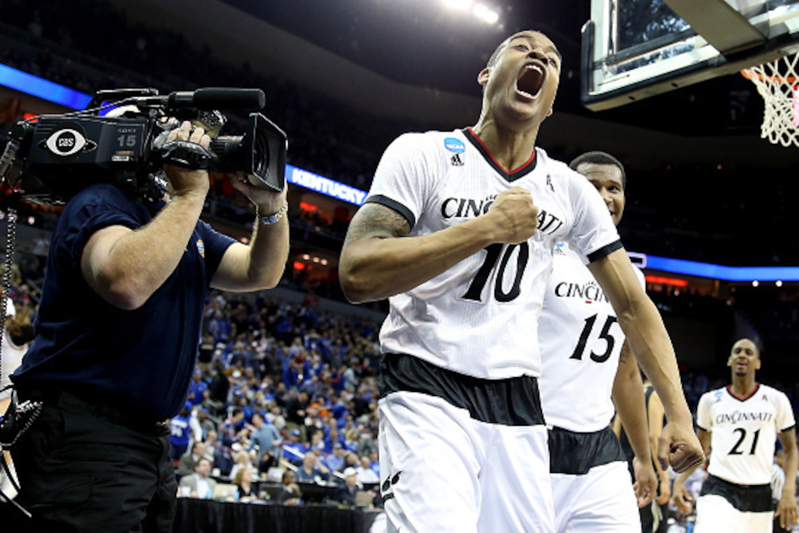 LOUISVILLE, KY - MARCH 19:  Troy Caupain #10 of the Cincinnati Bearcats reacts against the Purdue Boilermakers in the second half during the second round of the 2015 NCAA Men's Basketball Tournament at the KFC YUM! Center on March 19, 2015 in Louisville, 