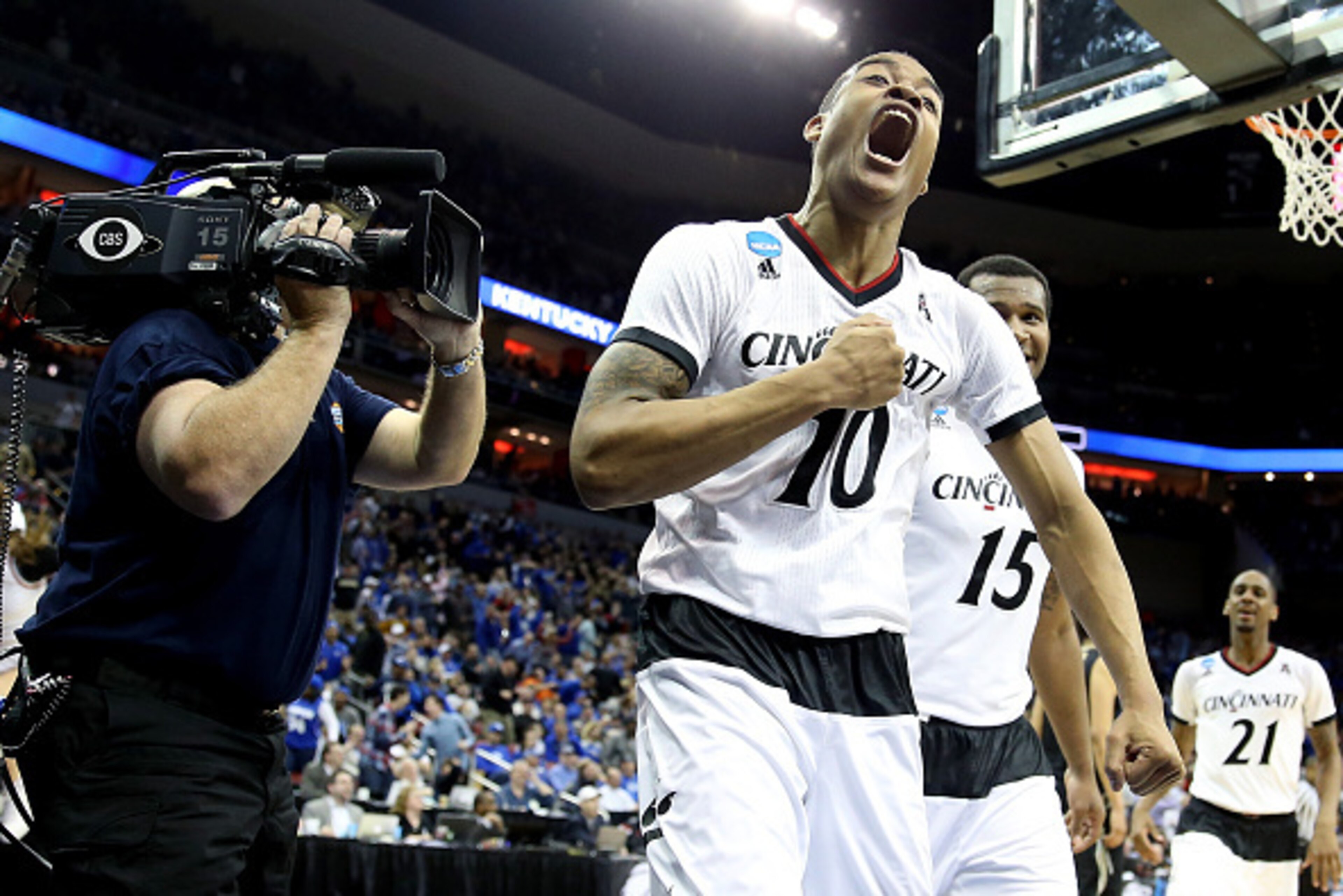 LOUISVILLE, KY - MARCH 19:  Troy Caupain #10 of the Cincinnati Bearcats reacts against the Purdue Boilermakers in the second half during the second round of the 2015 NCAA Men's Basketball Tournament at the KFC YUM! Center on March 19, 2015 in Louisville, 