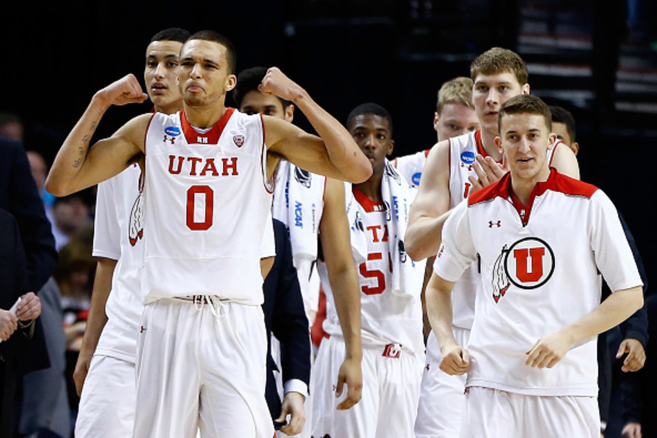 PORTLAND, OR - MARCH 19: Brekkott Chapman #0 of the Utah Utes reacts with his team in the first half against the Stephen F. Austin Lumberjacks during the second round of the 2015 NCAA Men's Basketball Tournament at Moda Center on March 19, 2015 in Portlan