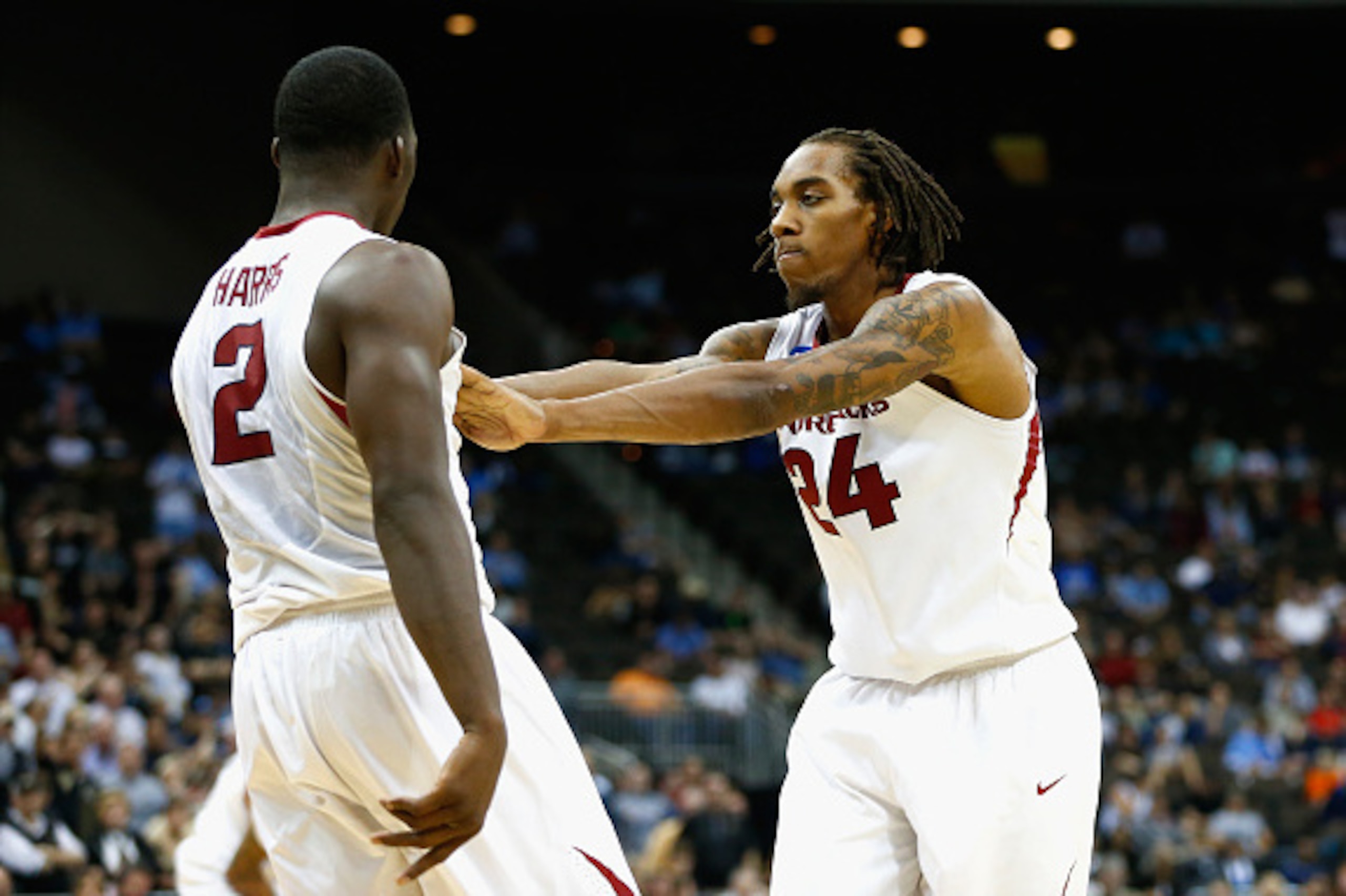 JACKSONVILLE, FL - MARCH 19:  Teammates Michael Qualls #24 and Alandise Harris #2 of the Arkansas Razorbacks react after a play against the Wofford Terriers during the second round of the 2015 NCAA Men's Basketball Tournament at Jacksonville Veterans Memo
