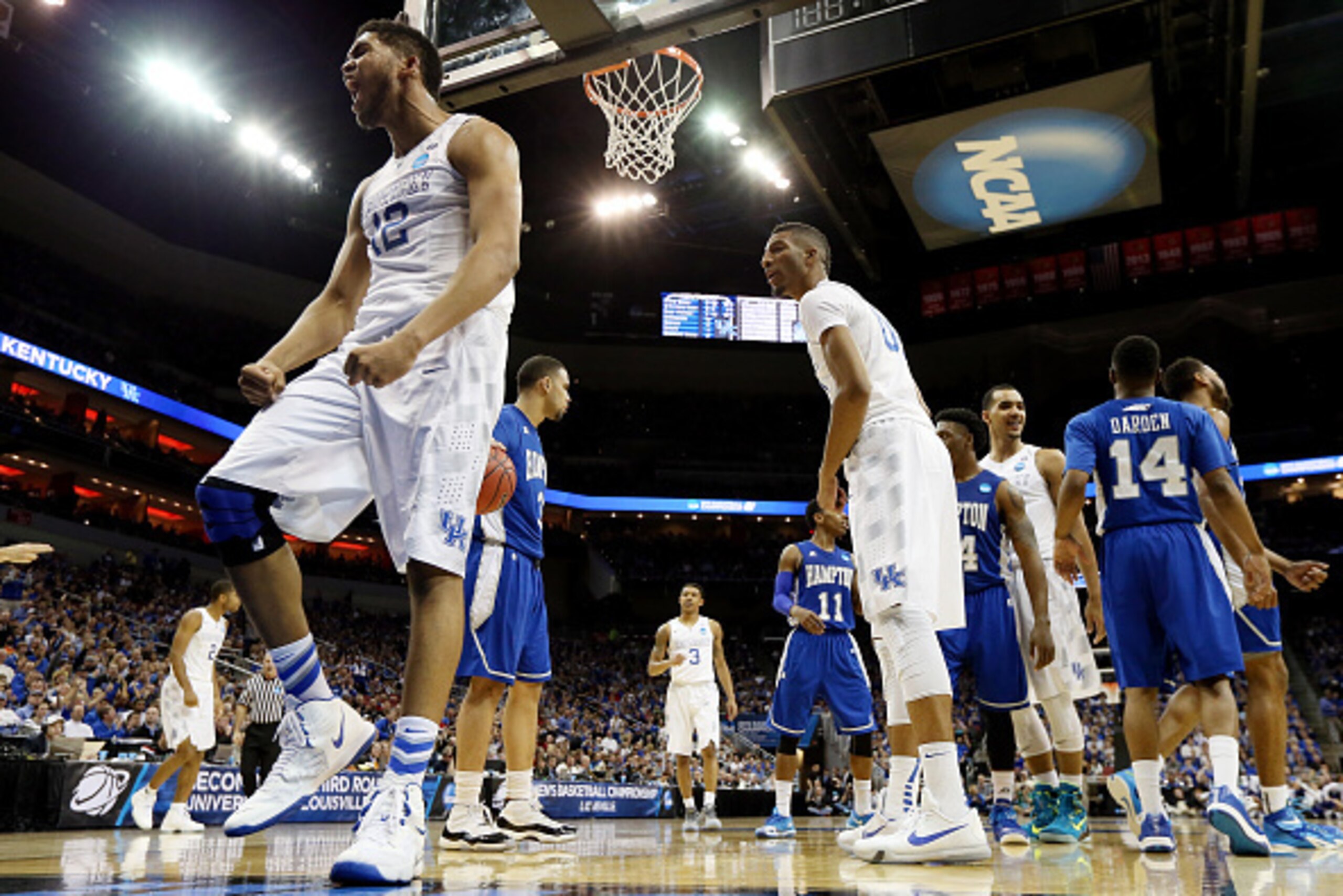 LOUISVILLE, KY - MARCH 19:  Karl-Anthony Towns #12 of the Kentucky Wildcats reacts against the Hampton Pirates during the second round of the 2015 NCAA Men's Basketball Tournament at the KFC YUM! Center on March 19, 2015 in Louisville, Kentucky.  (Photo b