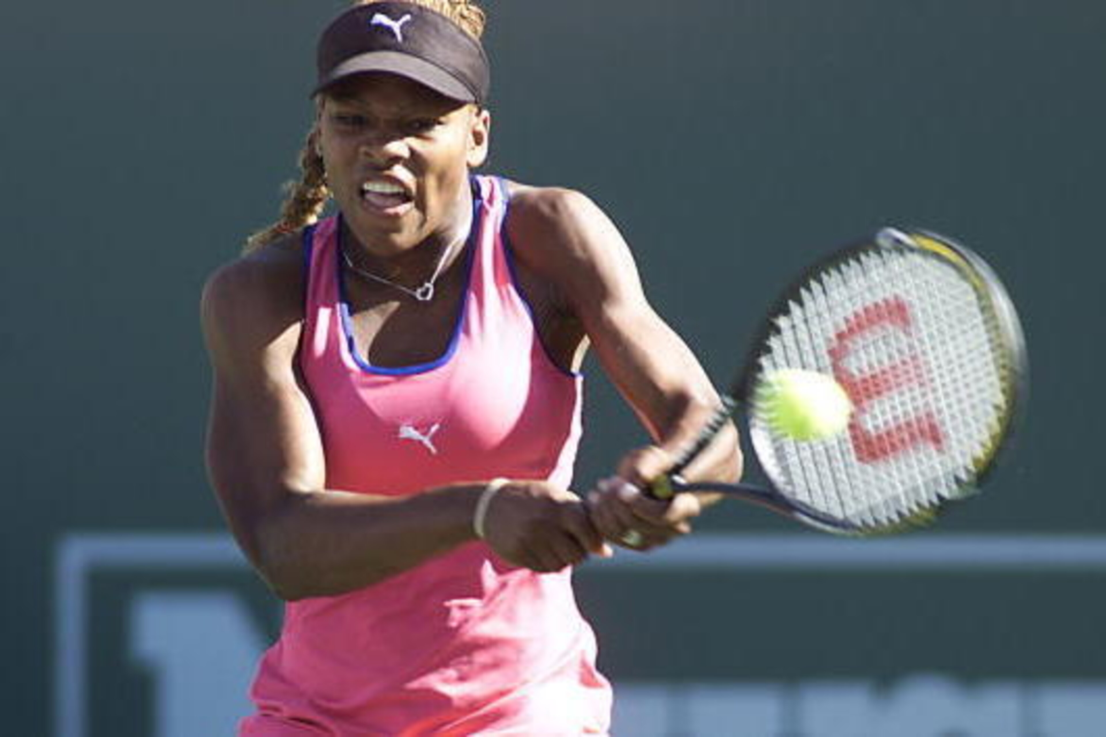 16 Mar 2001: Serena Williams of the USA hits a backhand against Kim Clijsters of Belgium during the final of the Tennis Masters Series at Indian Wells, Calfornia. <DIGITAL IMAGE> Mandatory Credit: Jed Jacobsohn/ALLSPORT 16 Mar 2001: Serena Williams of the USA hits a backhand against Kim Clijsters of Belgium during the final of the Tennis Masters Series at Indian Wells, Calfornia. <DIGITAL IMAGE> Mandatory Credit: Jed Jacobsohn/ALLSPORT