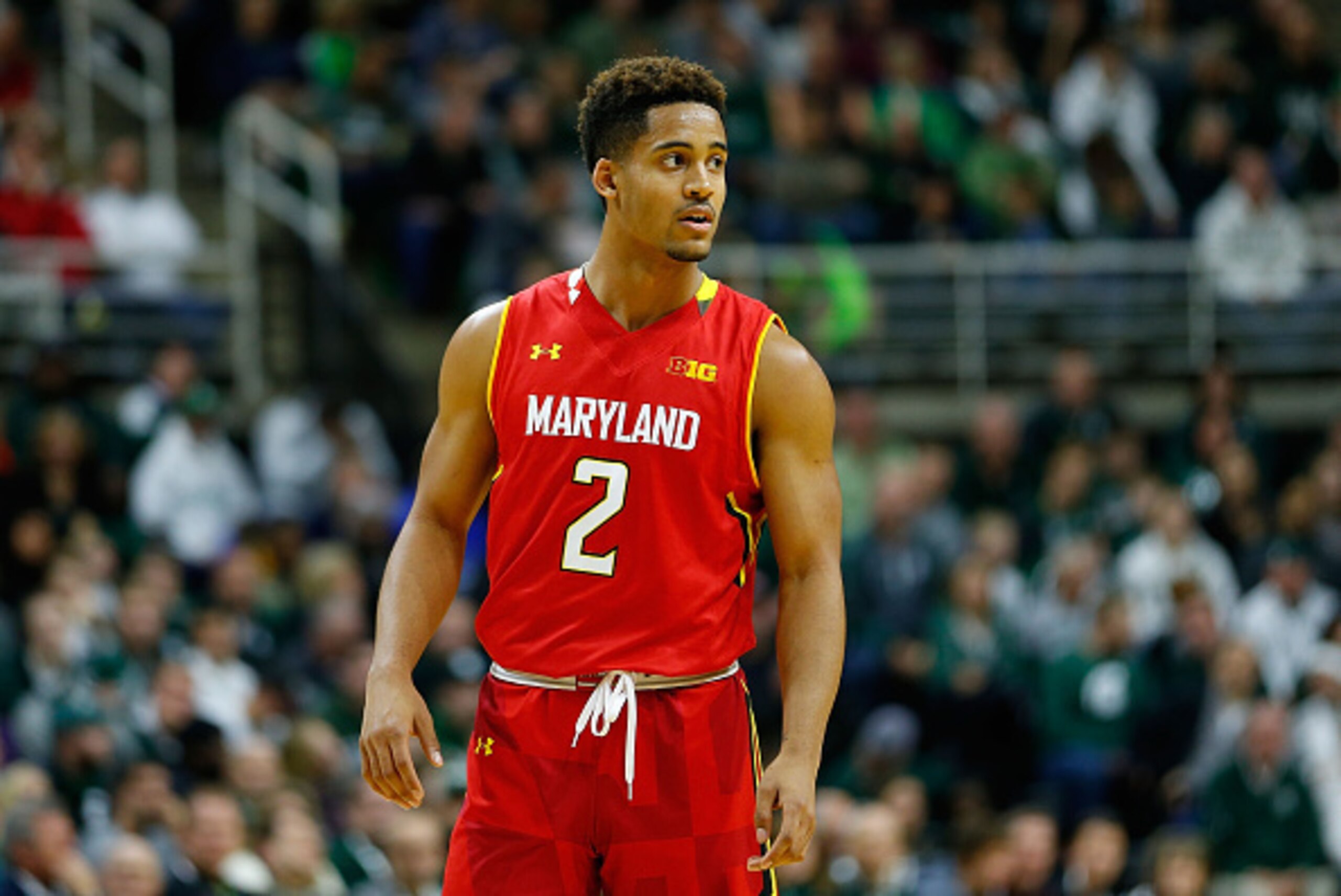 EAST LANSING, MI - DECEMBER 30:  Melo Trimble #2 of the Maryland Terrapins brings the ball up court during the second half of the game against the Michigan State Spartans at Breslin Center on December 30, 2014 in East Lansing, Michigan. Maryland defeated 