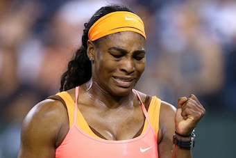 INDIAN WELLS, CA - MARCH 13:  Serena Williams celebrates a point in the final game against Monica Niculescu of Romania during day five of the BNP Paribas Open at the Indian Wells Tennis Garden on March 13, 2015 in Indian Wells, California.  (Photo by Matt