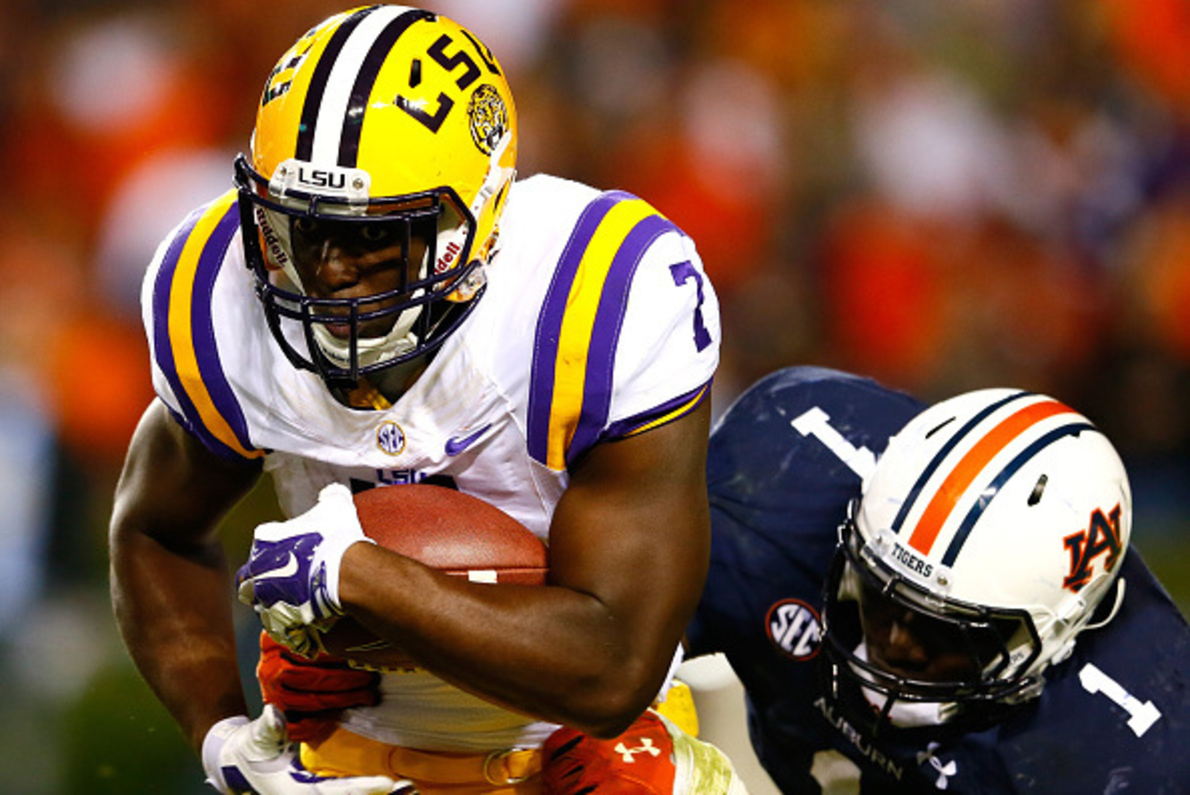 AUBURN, AL - OCTOBER 04: Leonard Fournette #7 of the LSU Tigers rushes against Montravius Adams #1 of the Auburn Tigers at Jordan Hare Stadium on October 4, 2014 in Auburn, Alabama. (Photo by Kevin C. Cox/Getty Images) AUBURN, AL - OCTOBER 04: Leonard Fournette #7 of the LSU Tigers rushes against Montravius Adams #1 of the Auburn Tigers at Jordan Hare Stadium on October 4, 2014 in Auburn, Alabama. (Photo by Kevin C. Cox/Getty Images)