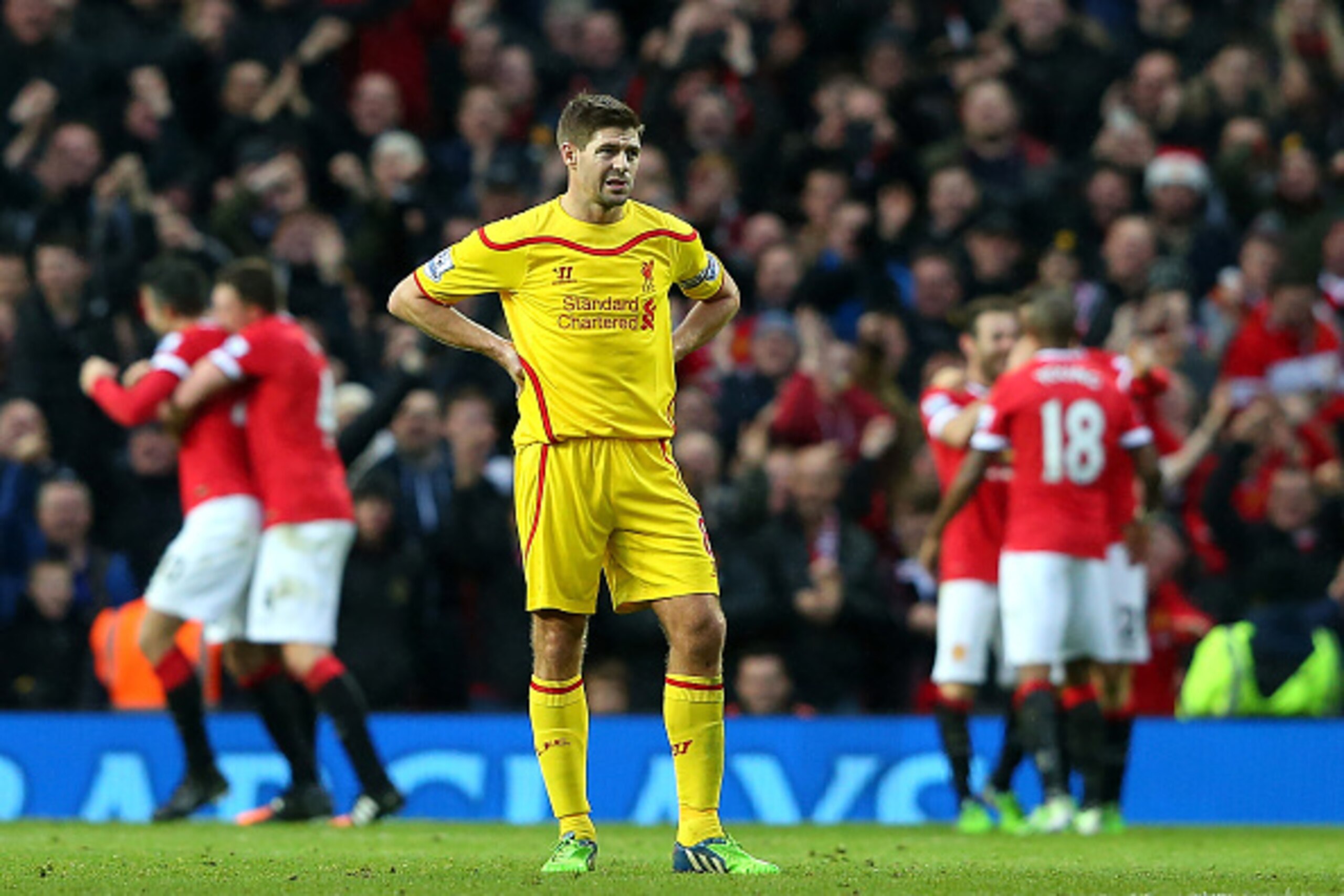 MANCHESTER, ENGLAND - DECEMBER 14:  Steven Gerrard of Liverpool looks dejected after his team conceded the third goal during the Barclays Premier League match between Manchester United and Liverpool at Old Trafford on December 14, 2014 in Manchester, Engl