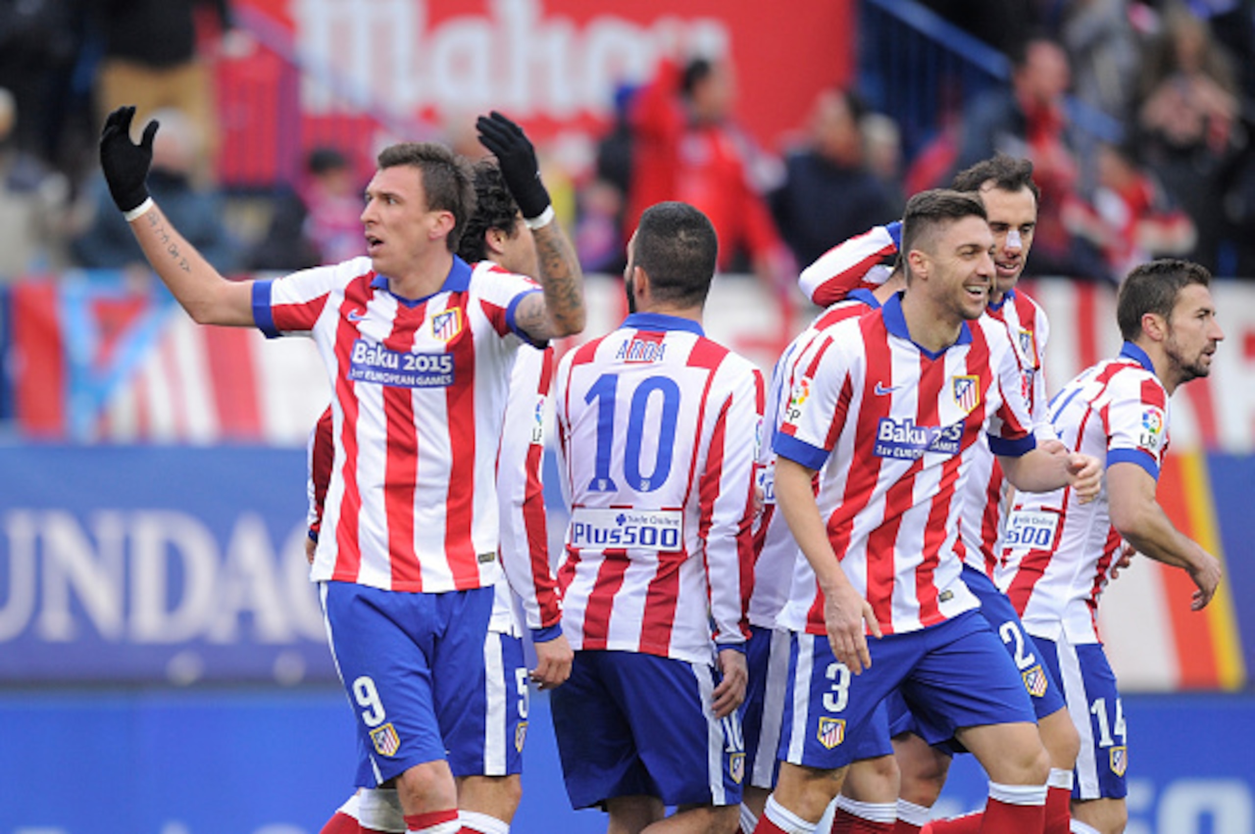 MADRID, SPAIN - FEBRUARY 07:  Mario Mandzukic of Club Atletico de Madrid celebrates after scoring his team's 4th goal during the La Liga match between Club Atletico de Madrid and Real Madrid at Vicente Calderon Stadium on February 7, 2015 in Madrid, Spain