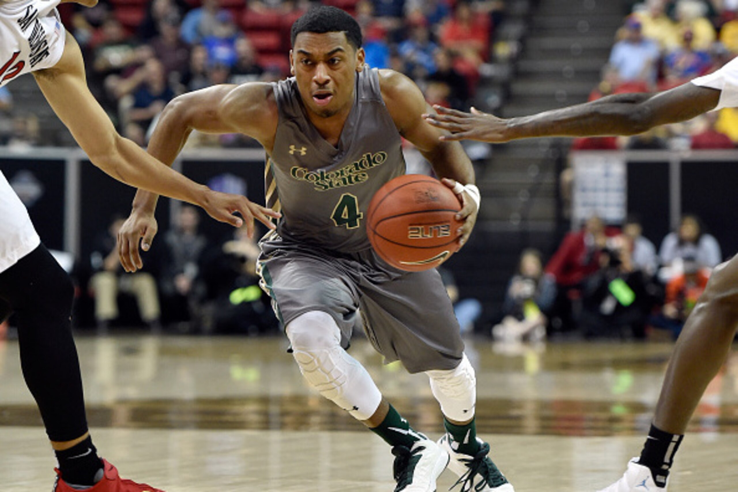 LAS VEGAS, NV - MARCH 13:  John Gillon #4 of the Colorado State Rams drives against the San Diego State Aztecs during a semifinal game of the Mountain West Conference basketball tournament at the Thomas & Mack Center on March 13, 2015 in Las Vegas, Nevada