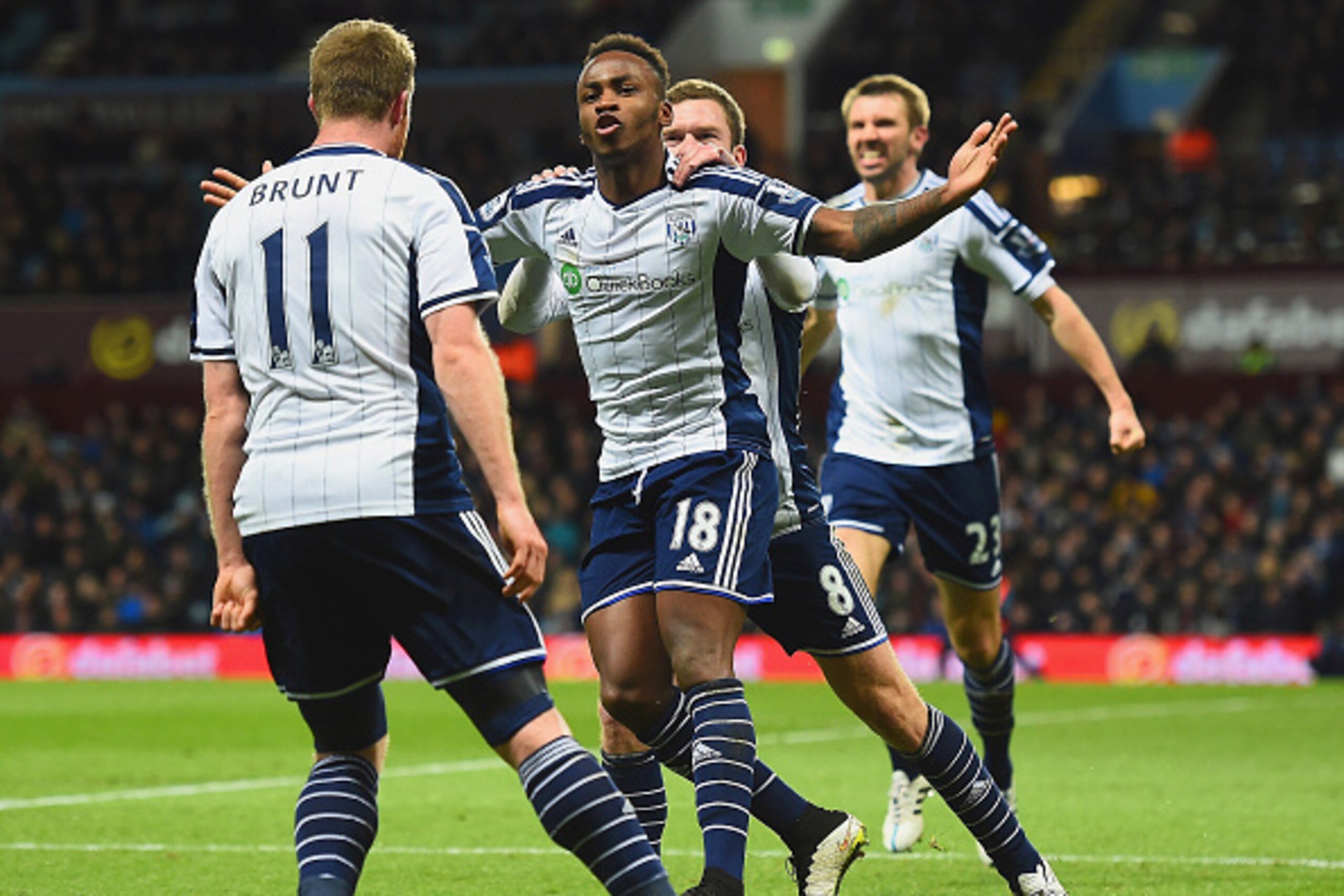 BIRMINGHAM, ENGLAND - MARCH 03:  Saido Berahino of West Brom celebrates scoring their first goal with Chris Brunt and Craig Gardner of West Brom during the Barclays Premier League match between Aston Villa and West Bromwich Albion at Villa Park on March 3