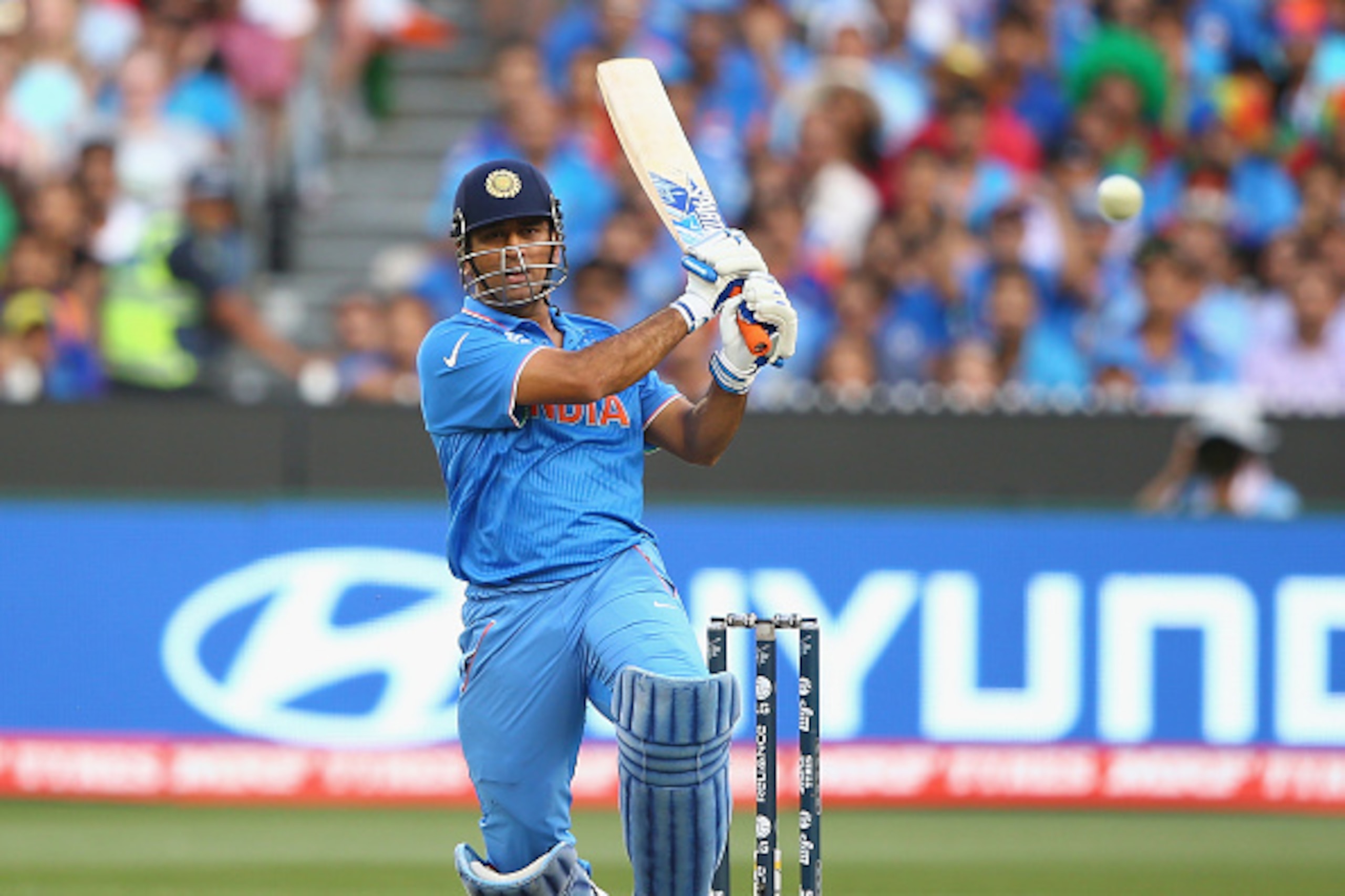 MELBOURNE, AUSTRALIA - MARCH 19: MS Dhoni of India bats during the 2015 ICC Cricket World Cup match between India and Bangldesh at Melbourne Cricket Ground on March 19, 2015 in Melbourne, Australia.  (Photo by Robert Cianflone/Getty Images)
