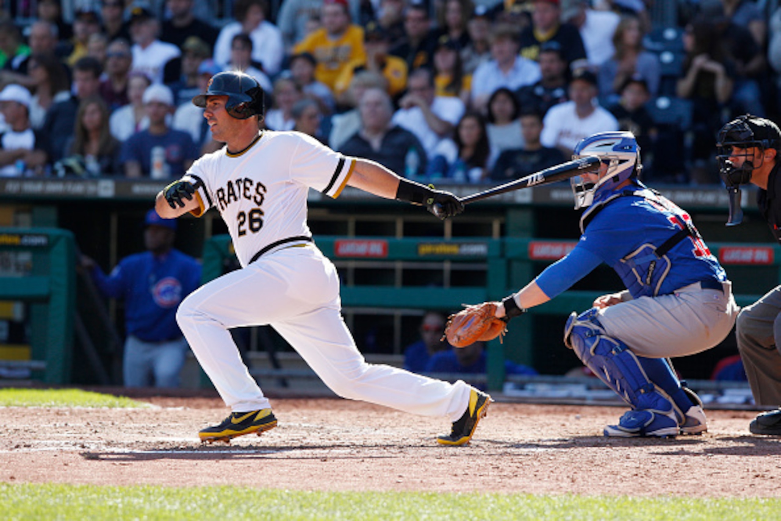 PITTSBURGH, PA - SEPTEMBER 14:  Tony Sanchez #26 of the Pittsburgh Pirates bats against the Chicago Cubs during the seventh inning of their game on September 14, 2014 at PNC Park in Pittsburgh, Pennsylvania.  The Pirates defeated the Cubs 7-3.  (Photo by 