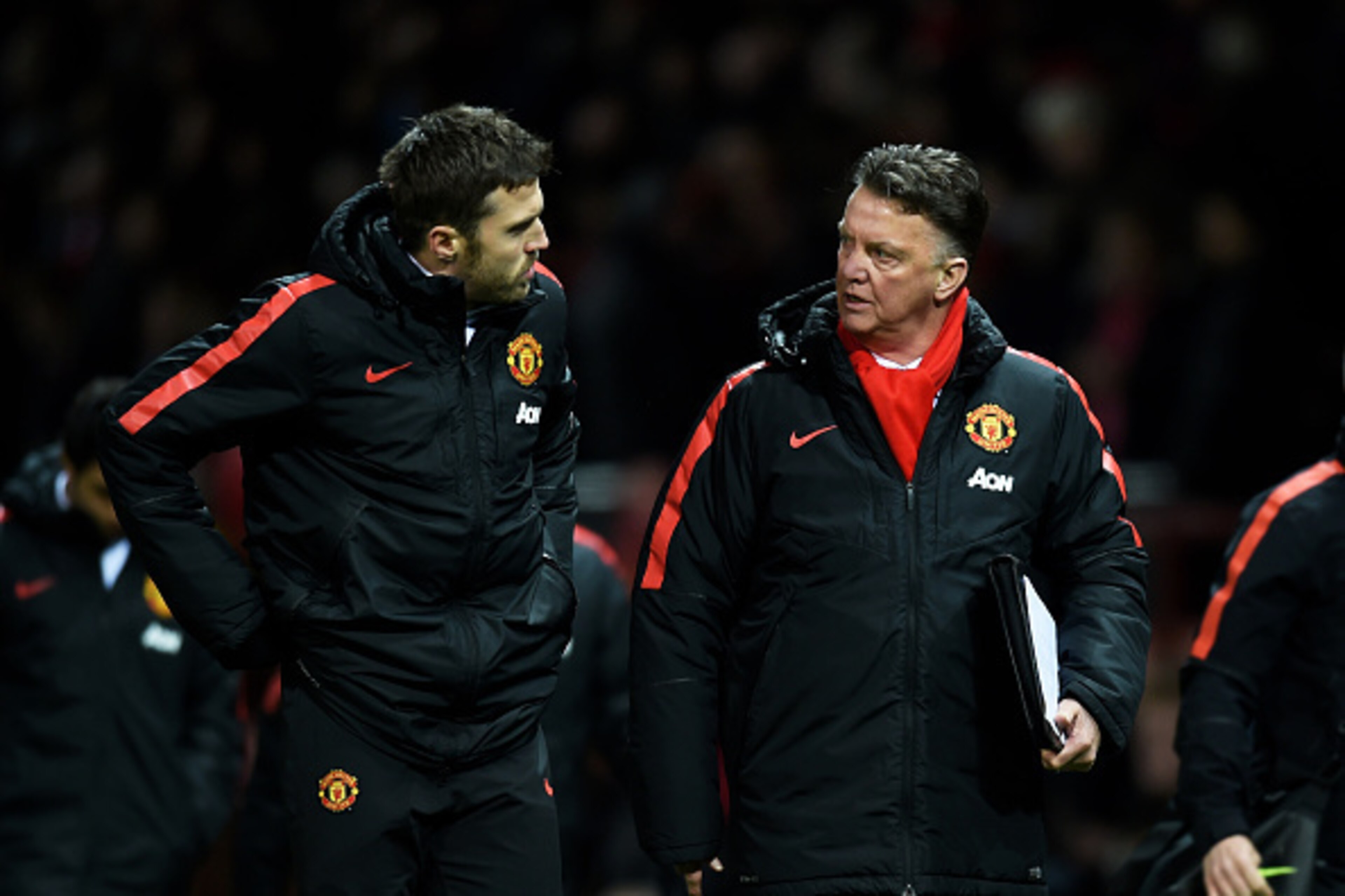 MANCHESTER, ENGLAND - MARCH 09: Louis van Gaal the manager of Manchester United speaks with Michael Carrick of Manchester United during the FA Cup Quarter Final match between Manchester United and Arsenal at Old Trafford on March 9, 2015 in Manchester, E MANCHESTER, ENGLAND - MARCH 09: Louis van Gaal the manager of Manchester United speaks with Michael Carrick of Manchester United during the FA Cup Quarter Final match between Manchester United and Arsenal at Old Trafford on March 9, 2015 in Manchester, E