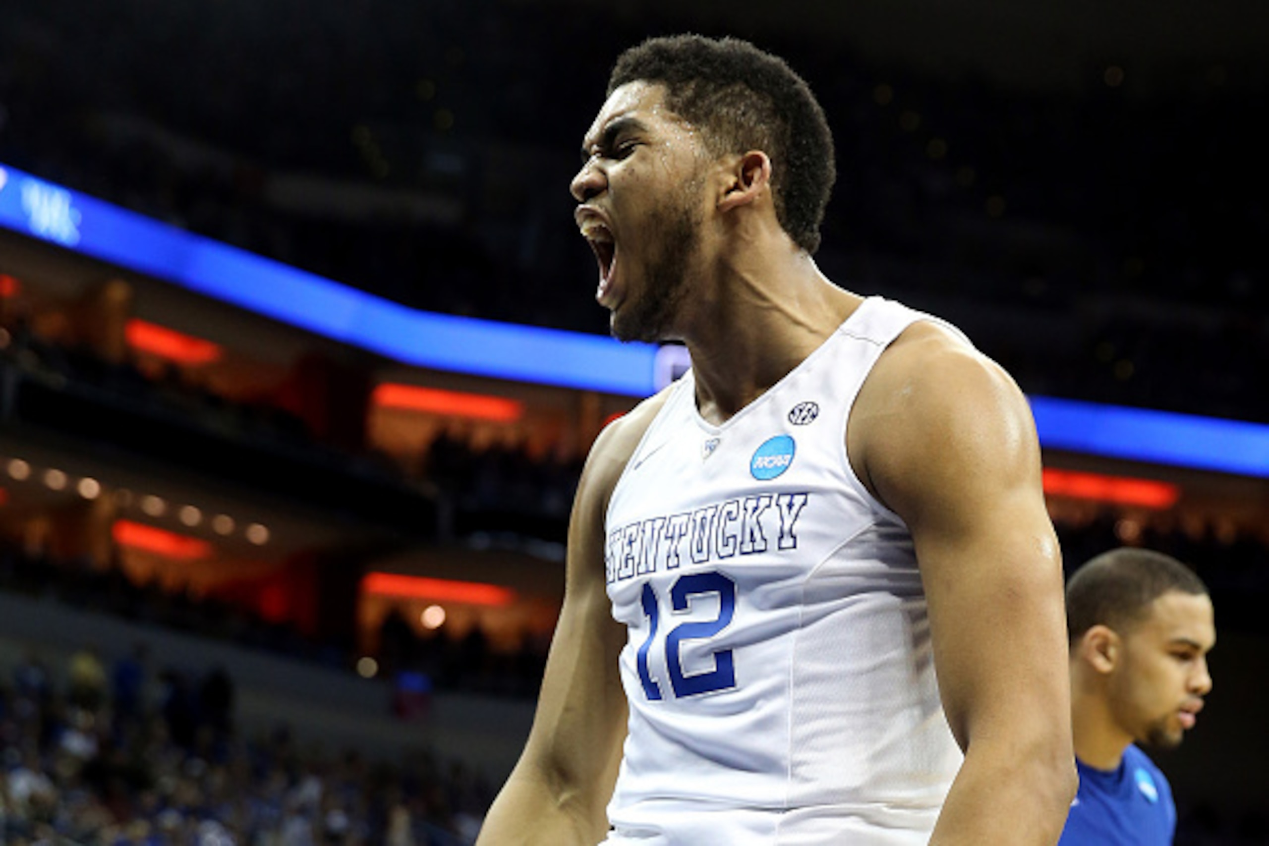 LOUISVILLE, KY - MARCH 19:  Karl-Anthony Towns #12 of the Kentucky Wildcats reacts against the Hampton Pirates during the second round of the 2015 NCAA Men's Basketball Tournament at the KFC YUM! Center on March 19, 2015 in Louisville, Kentucky.  (Photo b
