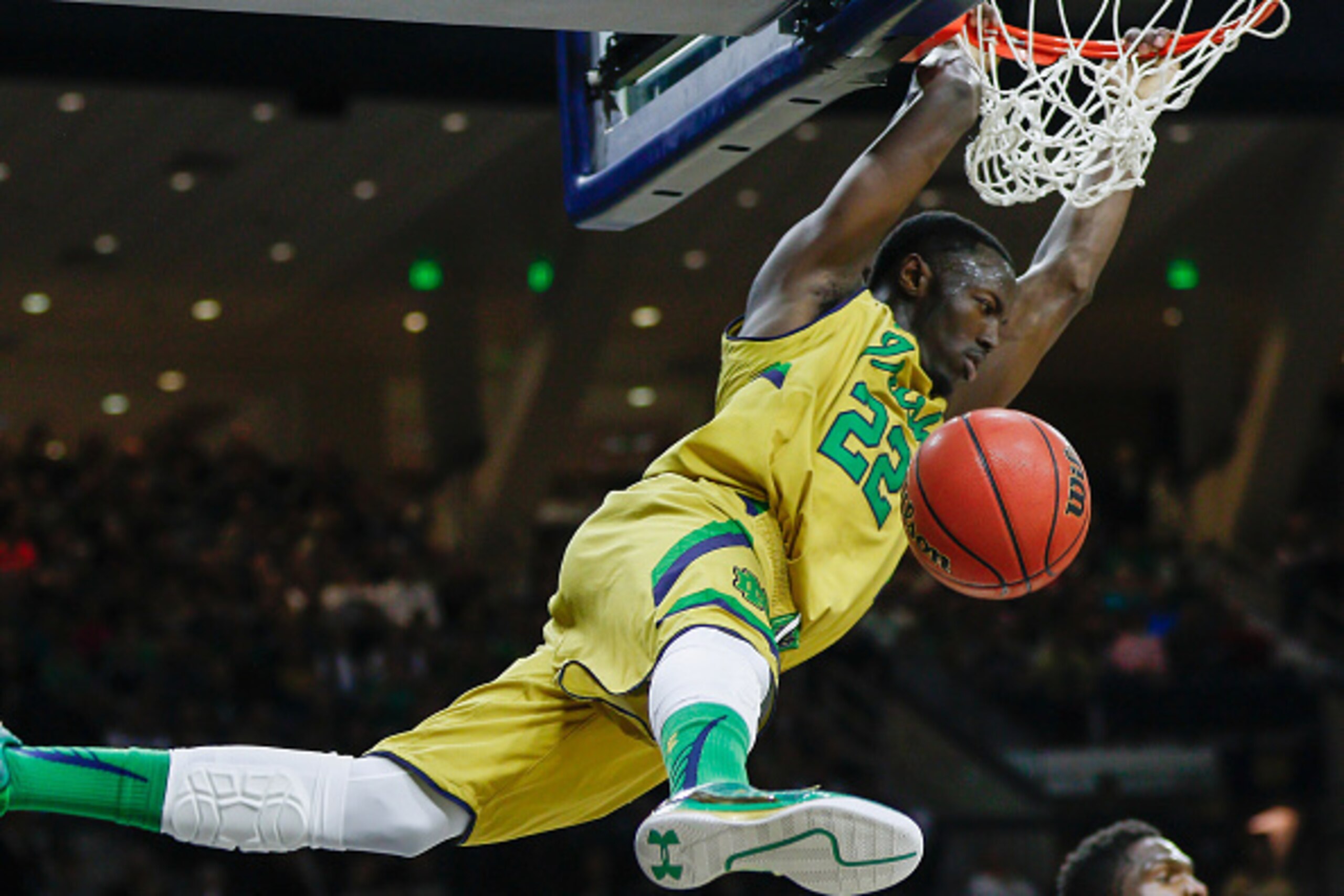 SOUTH BEND, IN - MARCH 07: Jerian Grant #22 of the Notre Dame Fighting Irish dunks the ball against the Clemson Tigers at Purcell Pavilion on March 7, 2015 in South Bend, Indiana. Notre Dame defeated Clemson 81-67. (Photo by Michael Hickey/Getty Images)