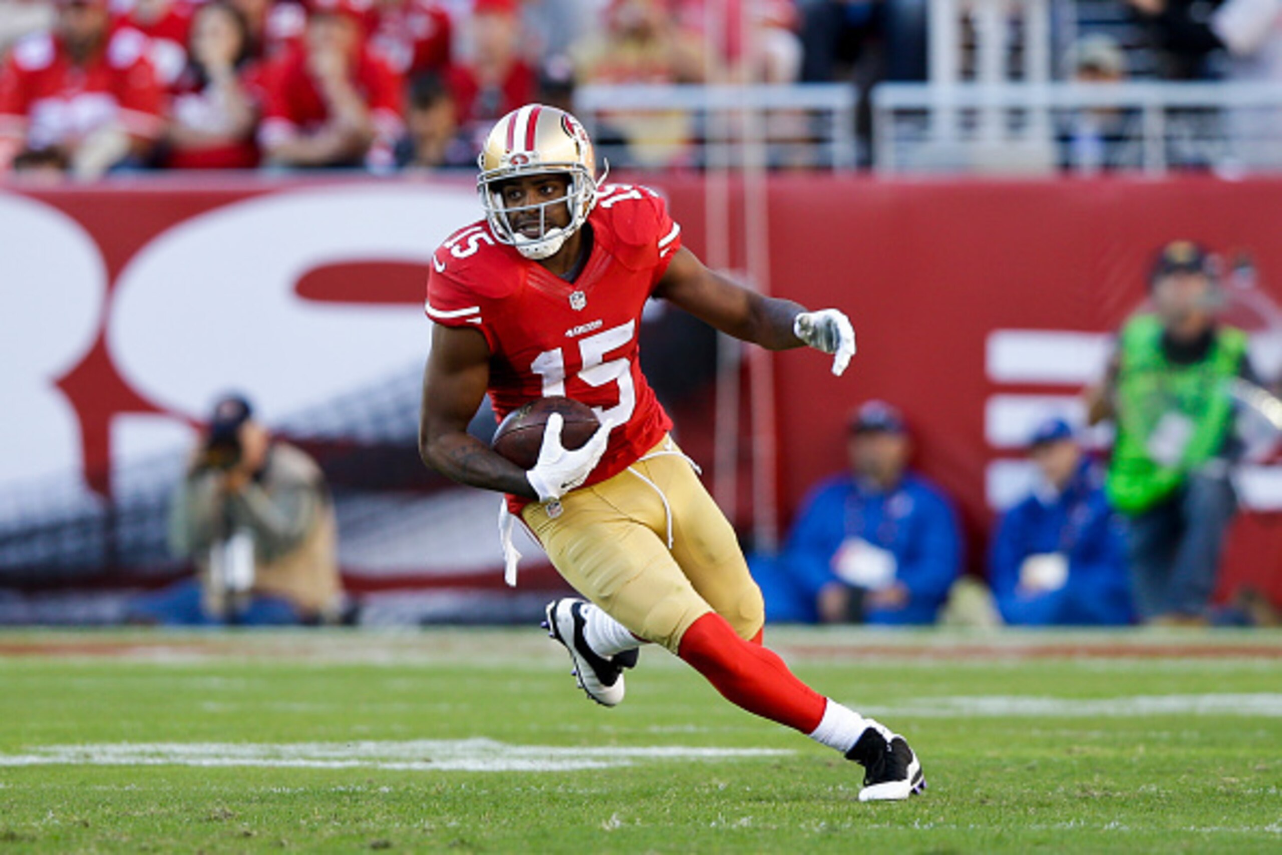 SANTA CLARA, CA - NOVEMBER 02: Michael Crabtree #15 of the San Francisco 49ers rushes up field after a pass reception against the St. Louis Rams during the third quarter at Levi's Stadium on November 2, 2014 in Santa Clara, California.  (Photo by Ezra Sha