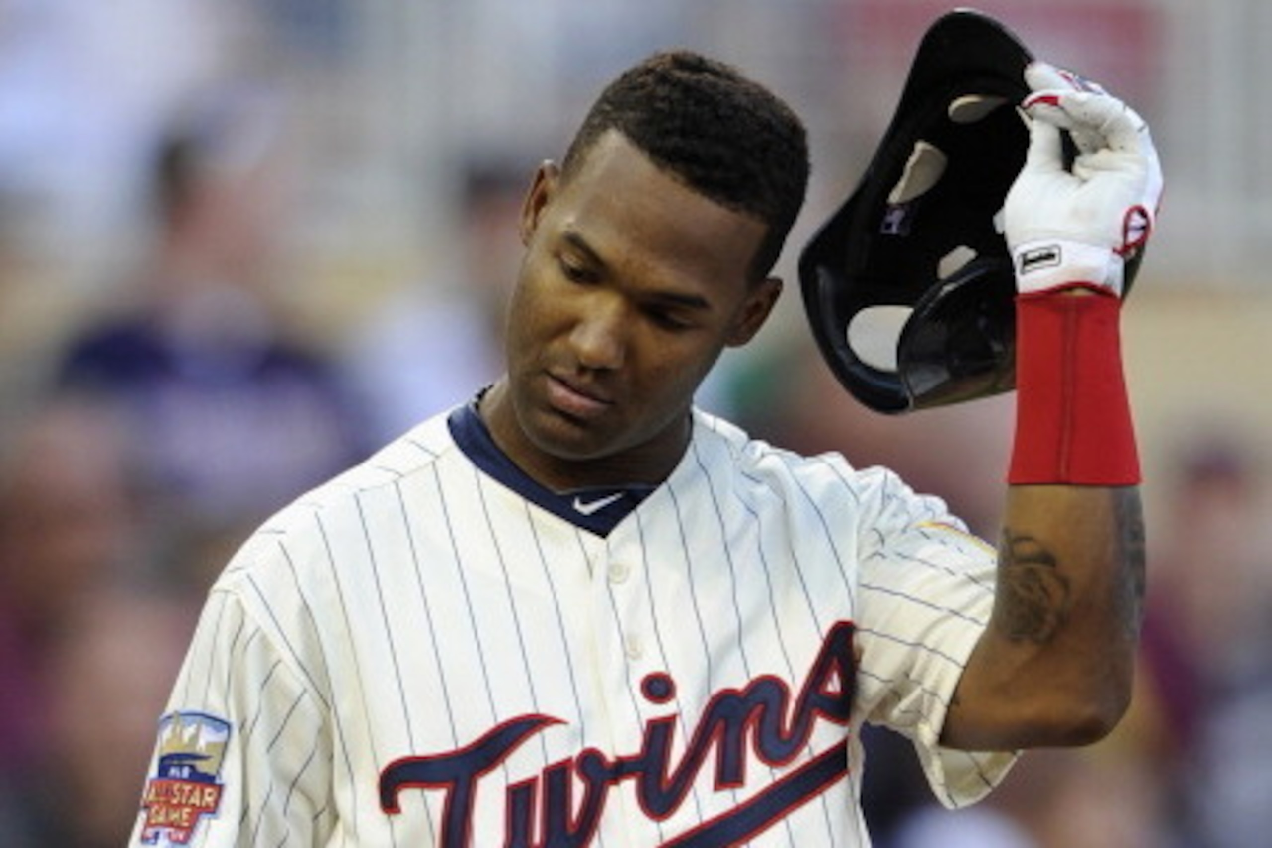 MINNEAPOLIS, MN - JULY 26: Danny Santana #39 of the Minnesota Twins reacts to striking out against the Chicago White Sox during the fifth inning of the game on July 26, 2014 at Target Field in Minneapolis, Minnesota. The White Sox defeated the Twins 7-0. 