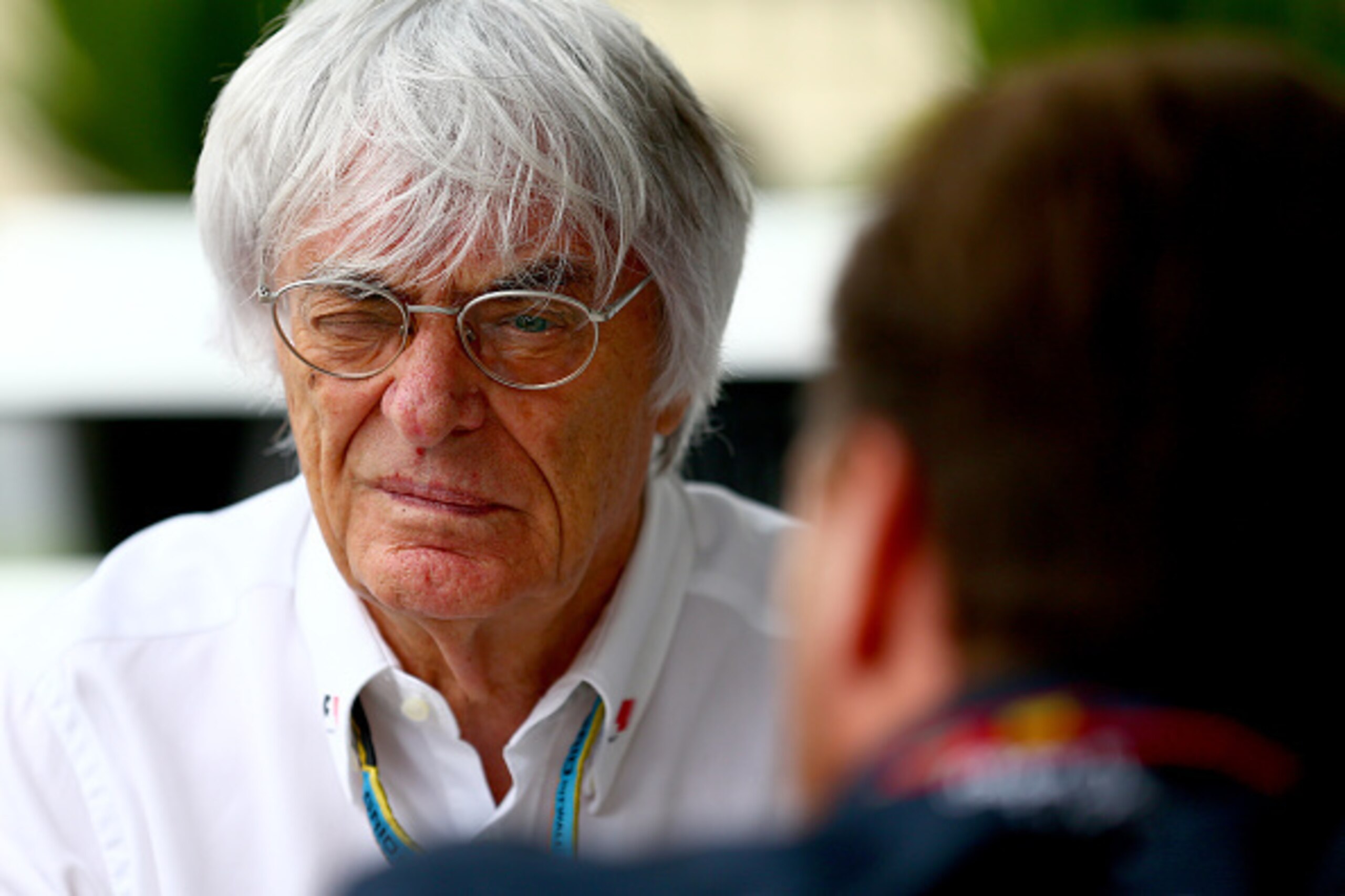 SAO PAULO, BRAZIL - NOVEMBER 08:  F1 supremo Bernie Ecclestone speaks with Infiniti Red Bull Racing Team Principal Christian Horner and team consultant Dr Helmut Marko during final practice for the Brazilian Formula One Grand Prix at Autodromo Jose Carlos