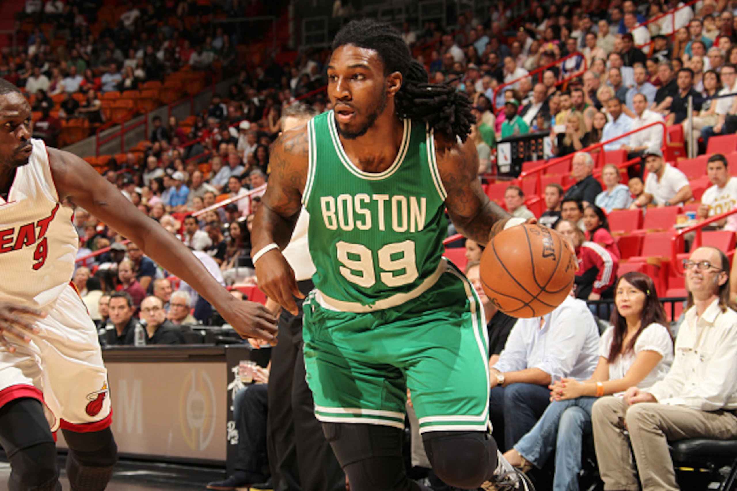 MIAMI, FL - MARCH 9: Jae Crowder #99 of the Boston Celtics drives to the basket against the Miami Heat during the game on March 9, 2015 at AmericanAirlines Arena in Miami, Florida. NOTE TO USER: User expressly acknowledges and agrees that, by downloading 