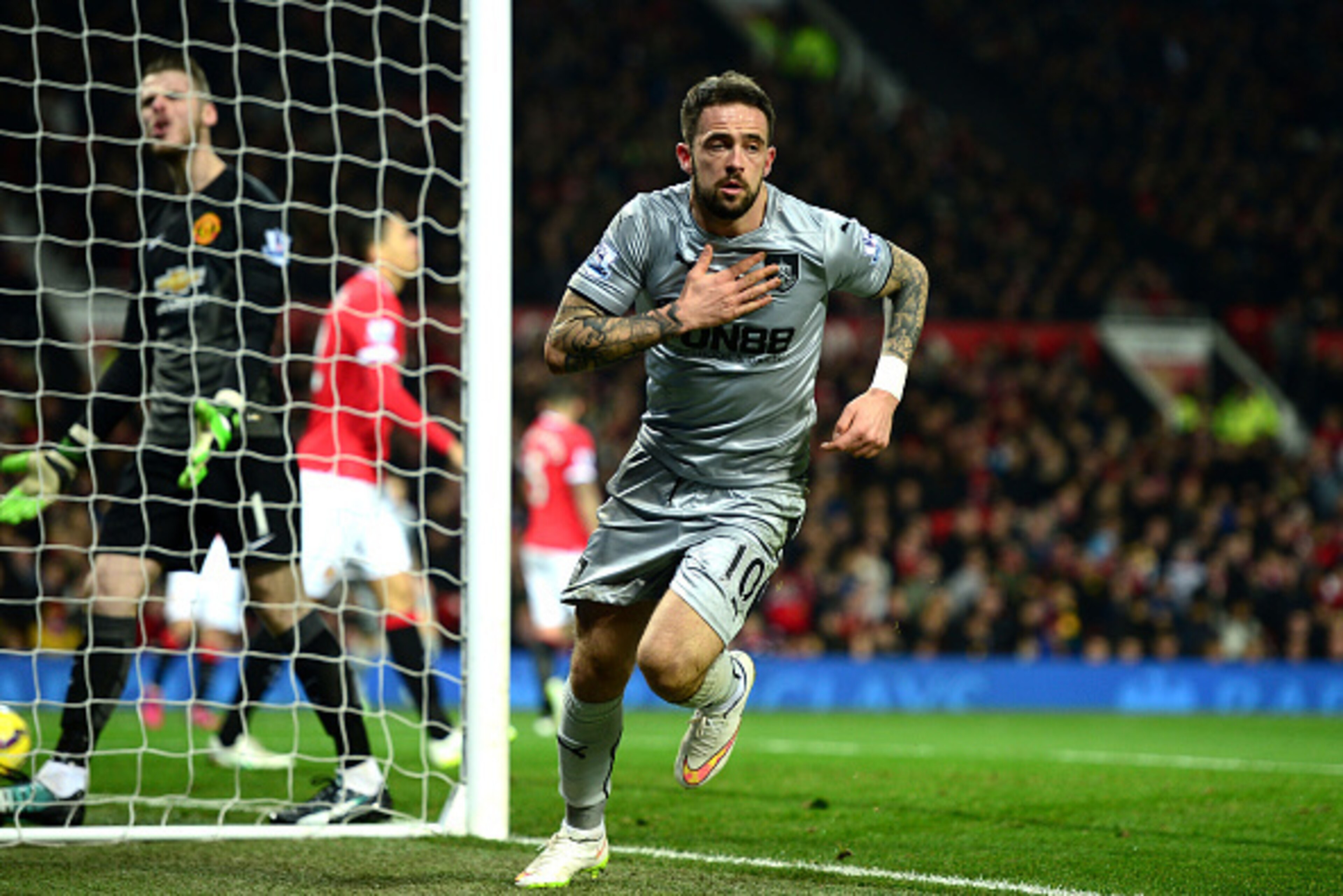 MANCHESTER, ENGLAND - FEBRUARY 11:  Danny Ings of Burnley celebrates his goal during the Barclays Premier League match between Manchester United and Burnley at Old Trafford on February 11, 2015 in Manchester, England.  (Photo by Jamie McDonald/Getty Image