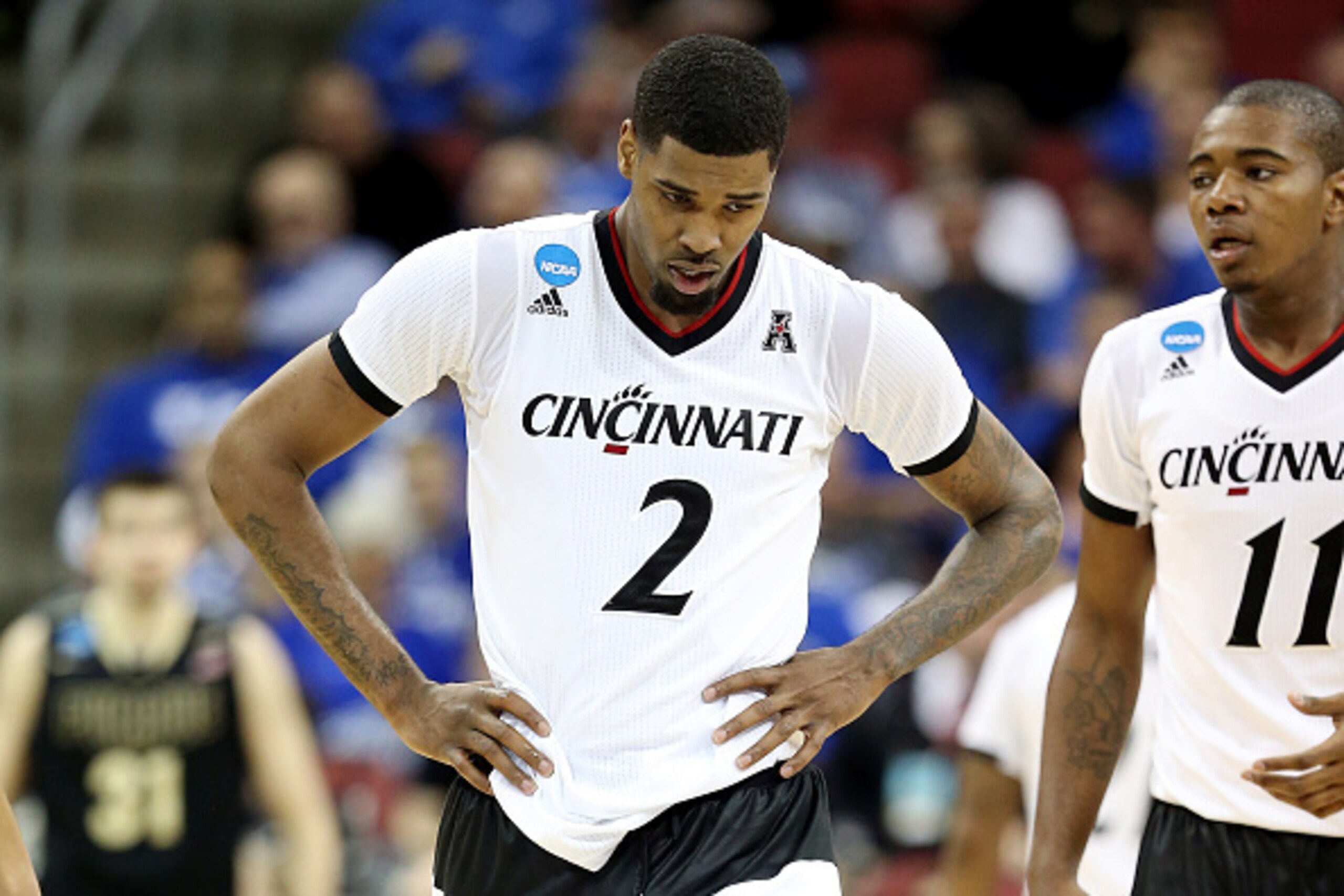 LOUISVILLE, KY - MARCH 19: Octavius Ellis #2 of the Cincinnati Bearcats reacts against the Purdue Boilermakers during the second round of the 2015 NCAA Men's Basketball Tournament at the KFC YUM! Center on March 19, 2015 in Louisville, Kentucky.  (Photo b