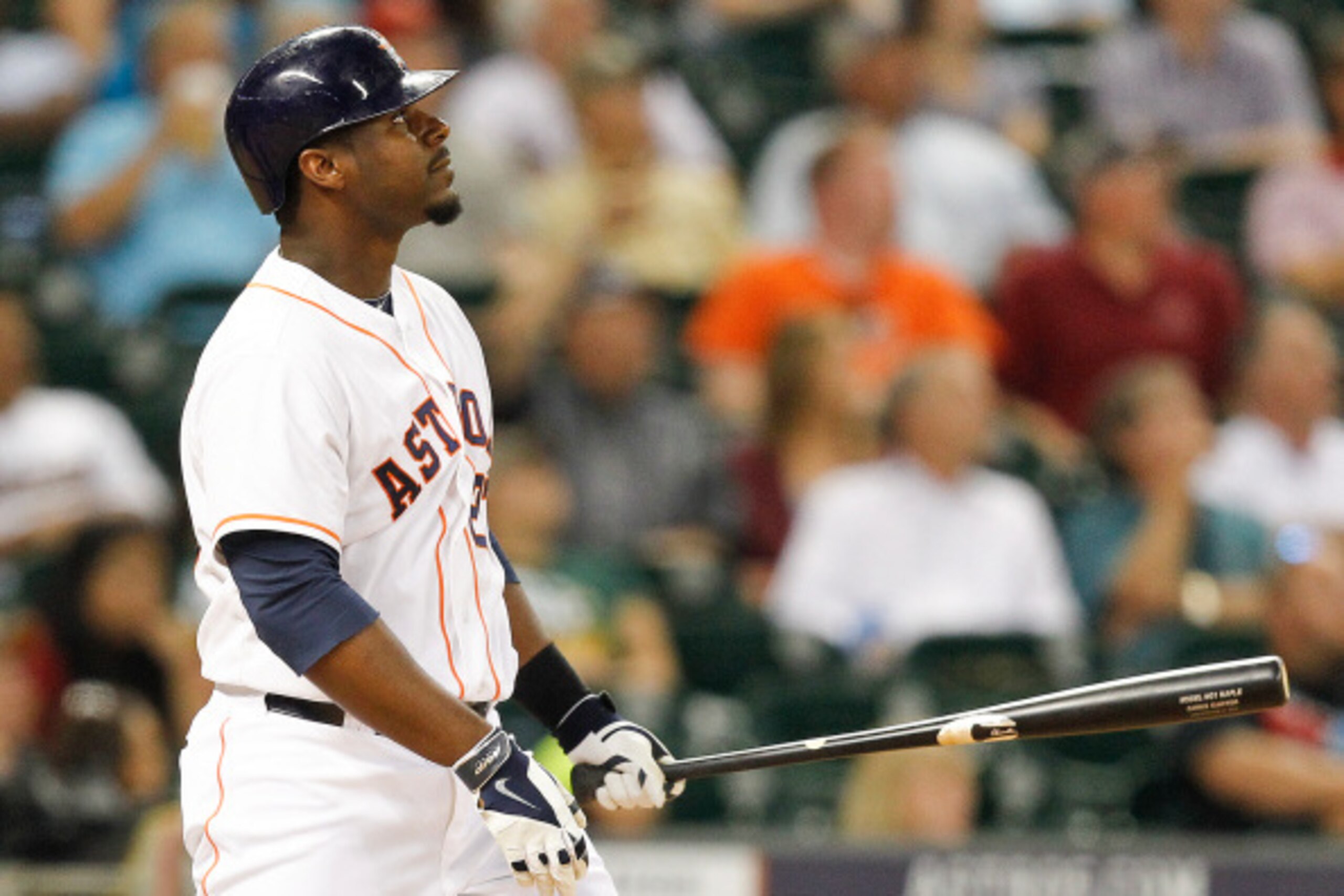 HOUSTON, TX - AUGUST 26:  Chris Carter #23 of the Houston Astros hits a three-run home run in the eighth inning against the Oakland Athletics at Minute Maid Park on August 26, 2014 in Houston, Texas.  (Photo by Bob Levey/Getty Images)