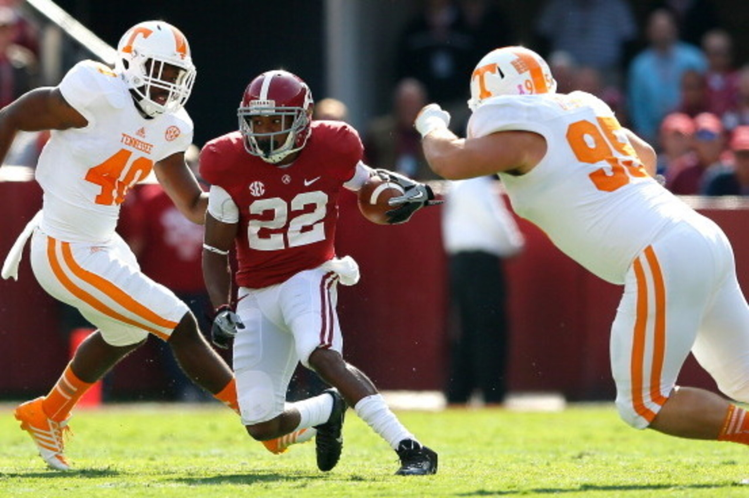 TUSCALOOSA, AL - OCTOBER 26: Christion Jones #22 of the Alabama Crimson Tide against Raiques Crump #40 and Danny O'Brien #95 of the Tennessee Volunteers at Bryant-Denny Stadium on October 26, 2013 in Tuscaloosa, Alabama. (Photo by Kevin C. Cox/Getty Ima TUSCALOOSA, AL - OCTOBER 26: Christion Jones #22 of the Alabama Crimson Tide against Raiques Crump #40 and Danny O'Brien #95 of the Tennessee Volunteers at Bryant-Denny Stadium on October 26, 2013 in Tuscaloosa, Alabama. (Photo by Kevin C. Cox/Getty Ima