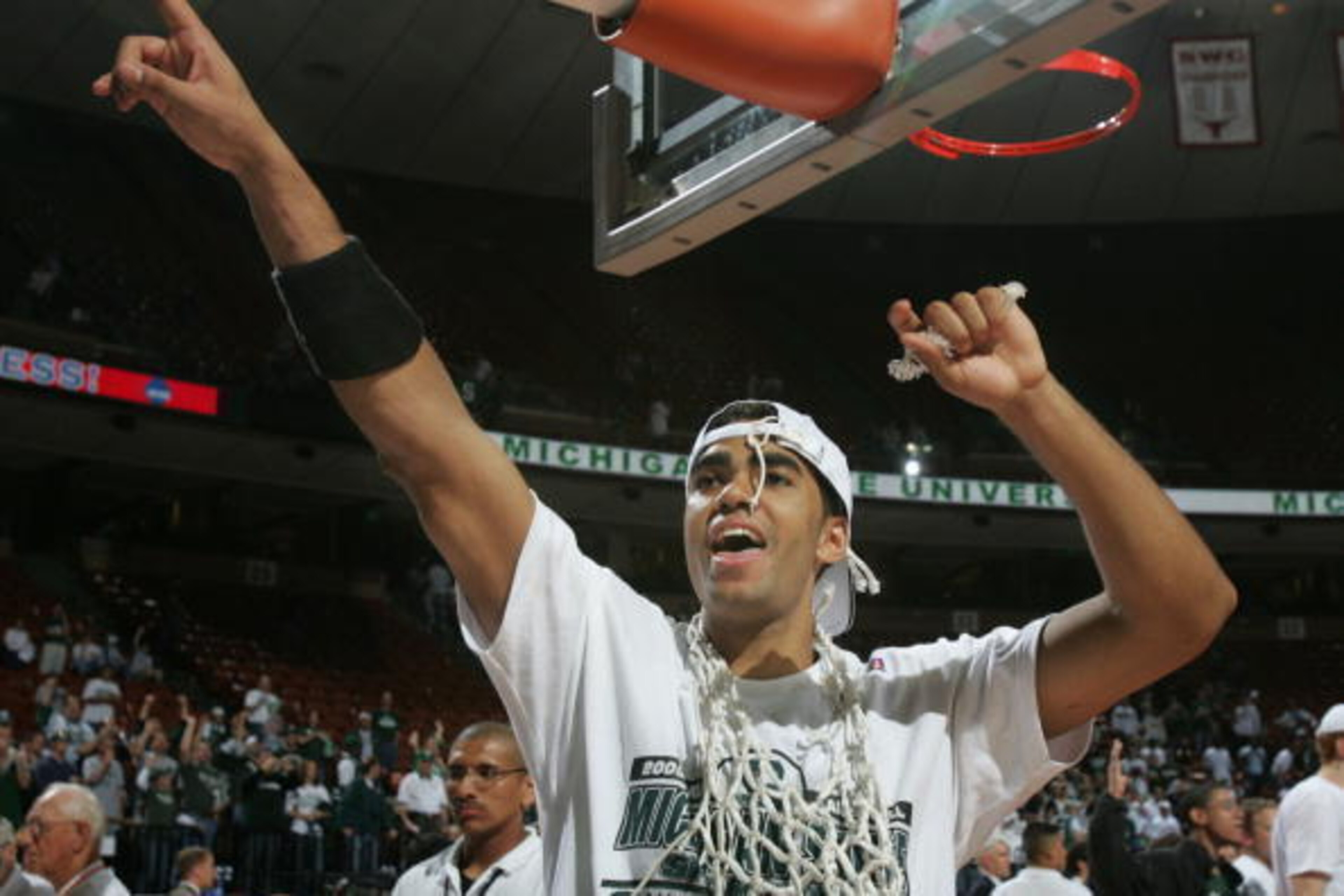 AUSTIN, TX - MARCH 27:  Chris Hill #5 of the Michigan State Spartans celebrates after cutting down part of the net and defeating the Kentucky Wildcats in the 2005 NCAA division 1 men's basketball championship tournament game at the Frank Erwin Center on M