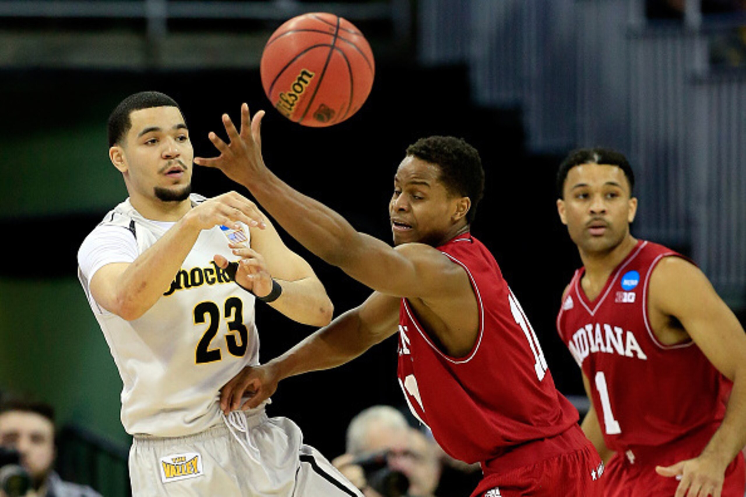 OMAHA, NE - MARCH 20: Fred VanVleet #23 of the Wichita State Shockers passes as Yogi Ferrell #11 of the Indiana Hoosiers defends during the second round of the 2015 NCAA Men's Basketball Tournament at the CenturyLink Center on March 20, 2015 in Omaha, Neb
