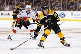 BOSTON, MA - MARCH 05:  David Pastrnak #88 of the Boston Bruins looks for a shot on goal during the first period against the Calgary Flames at TD Garden on March 5, 2015 in Boston, Massachusetts.  (Photo by Maddie Meyer/Getty Images)