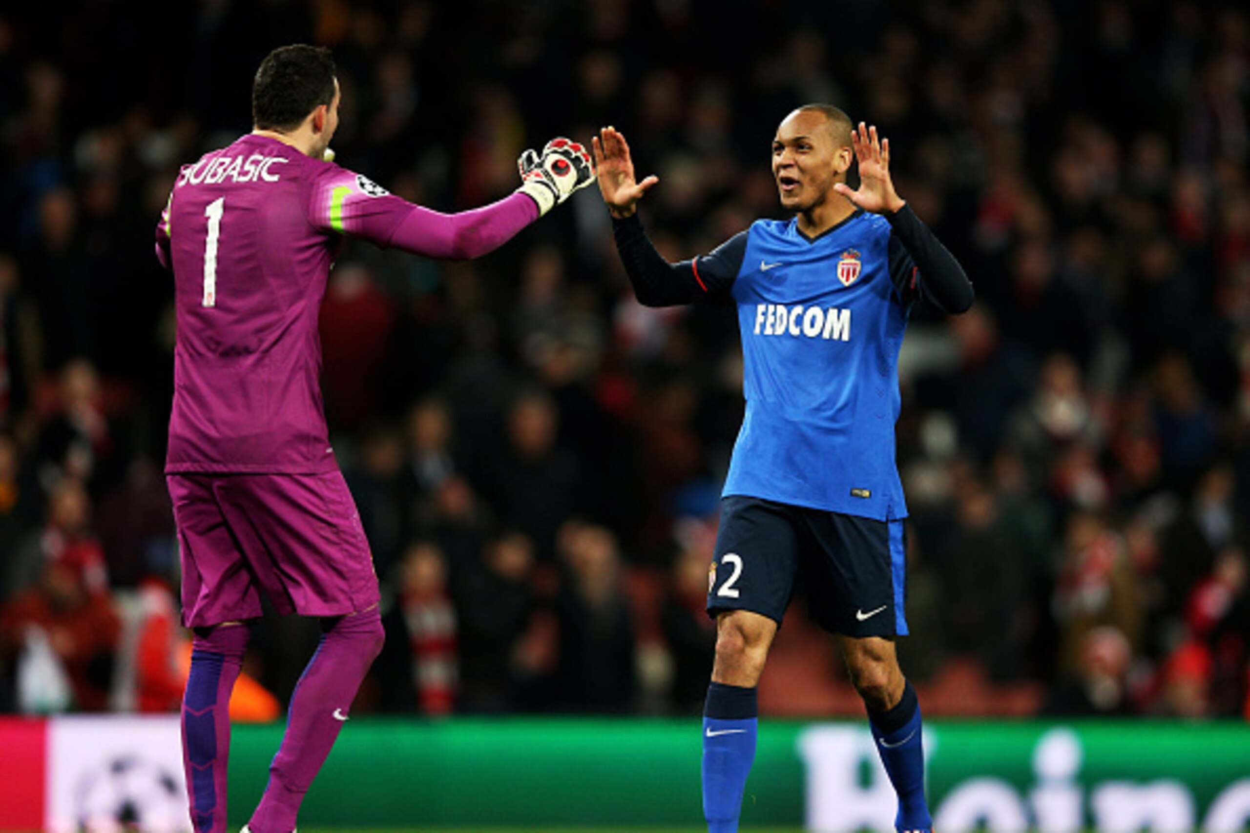 LONDON, ENGLAND - FEBRUARY 25:  Goalkeeper Danijel Subasic of Monaco and Fabinho of Monaco celebrate following their team's 3-1 victory during the UEFA Champions League round of 16, first leg match between Arsenal and Monaco at The Emirates Stadium on Feb