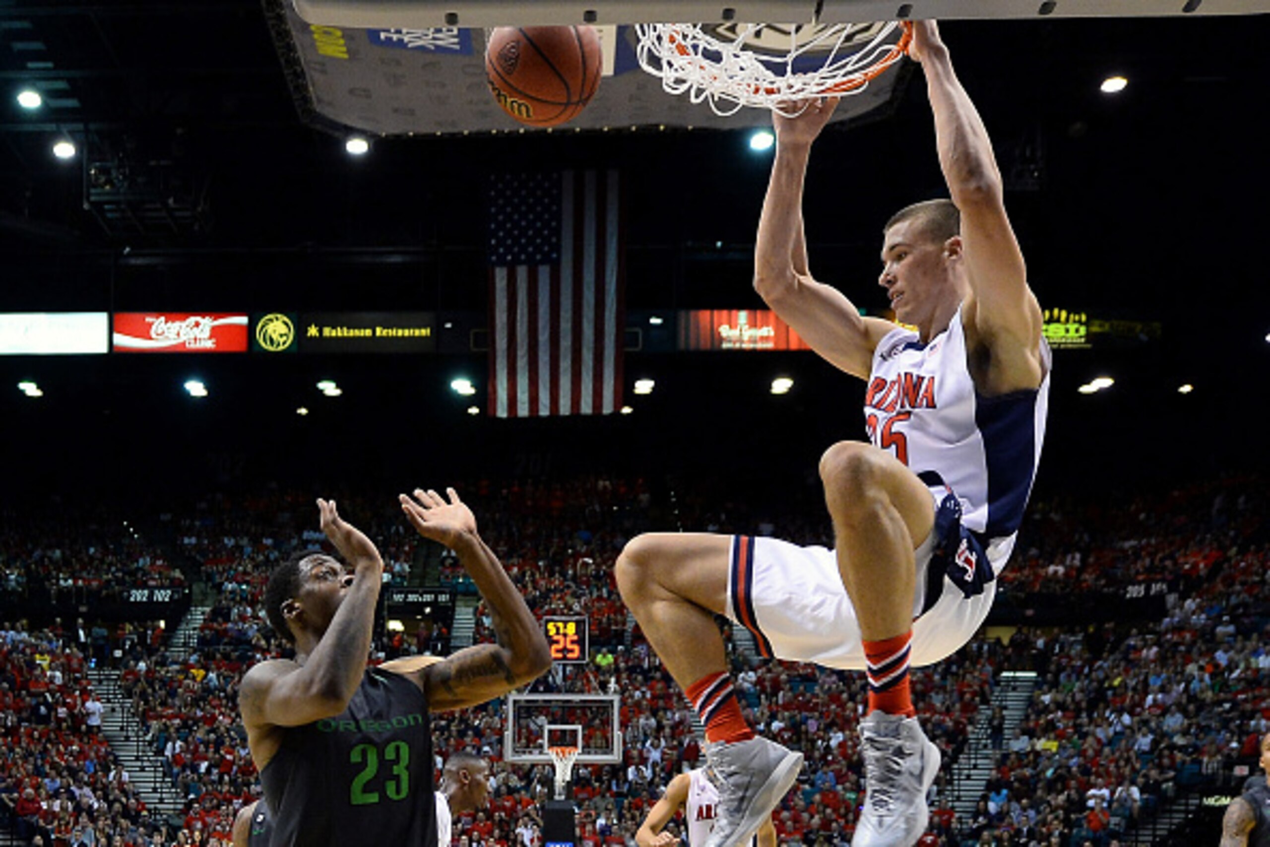 LAS VEGAS, NV - MARCH 14:  Kaleb Tarczewski #35 of the Arizona Wildcats dunks against Elgin Cook #23 of the Oregon Ducks during the championship game of the Pac-12 Basketball Tournament at the MGM Grand Garden Arena on March 14, 2015 in Las Vegas, Nevada.