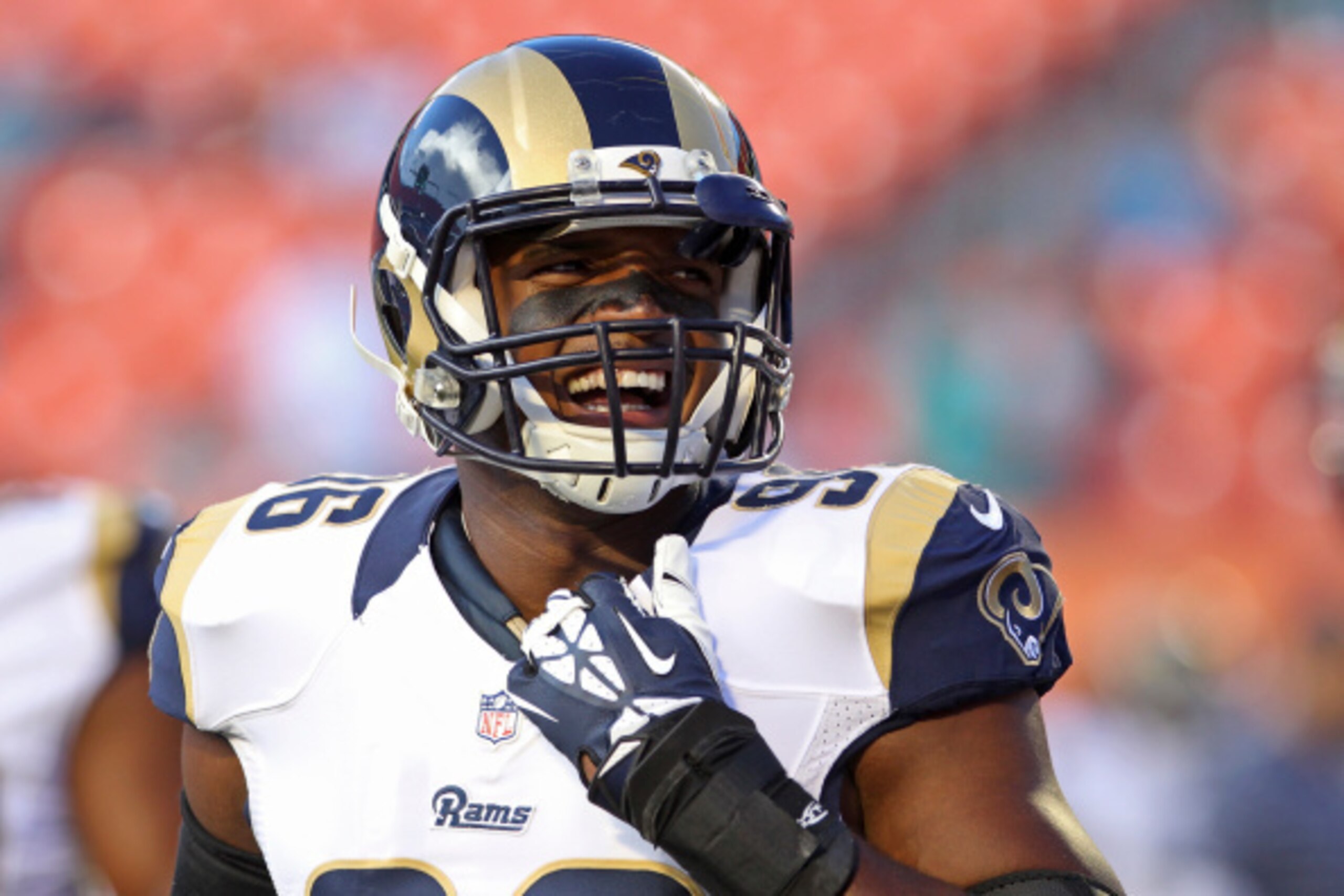 MIAMI GARDENS, FL - AUGUST 28: Defensive end Michael Sam #96 of the St. Louis Rams reacts during pregame workouts before his team met the Miami Dolphins at Sun Life Stadium on August 28, 2014 in Miami Gardens, Florida. (Photo by Marc Serota/Getty Images MIAMI GARDENS, FL - AUGUST 28: Defensive end Michael Sam #96 of the St. Louis Rams reacts during pregame workouts before his team met the Miami Dolphins at Sun Life Stadium on August 28, 2014 in Miami Gardens, Florida. (Photo by Marc Serota/Getty Images