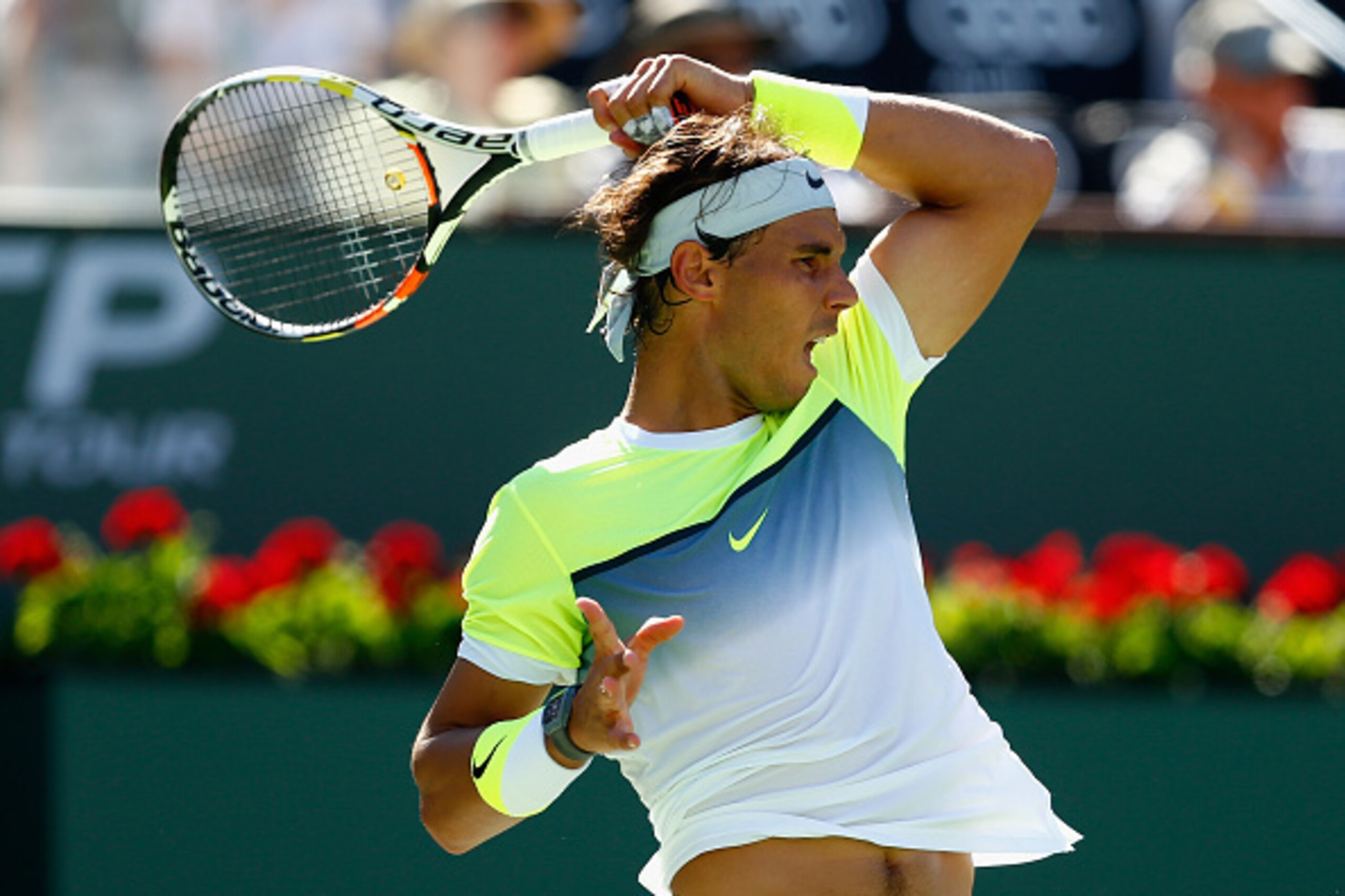 INDIAN WELLS, CA - MARCH 20:  Rafael Nadal of Spain in action against Milos Raonic of Canada during day twelve of the BNP Paribas Open tennis at the Indian Wells Tennis Garden on March 20, 2015 in Indian Wells, California.  (Photo by Julian Finney/Getty I