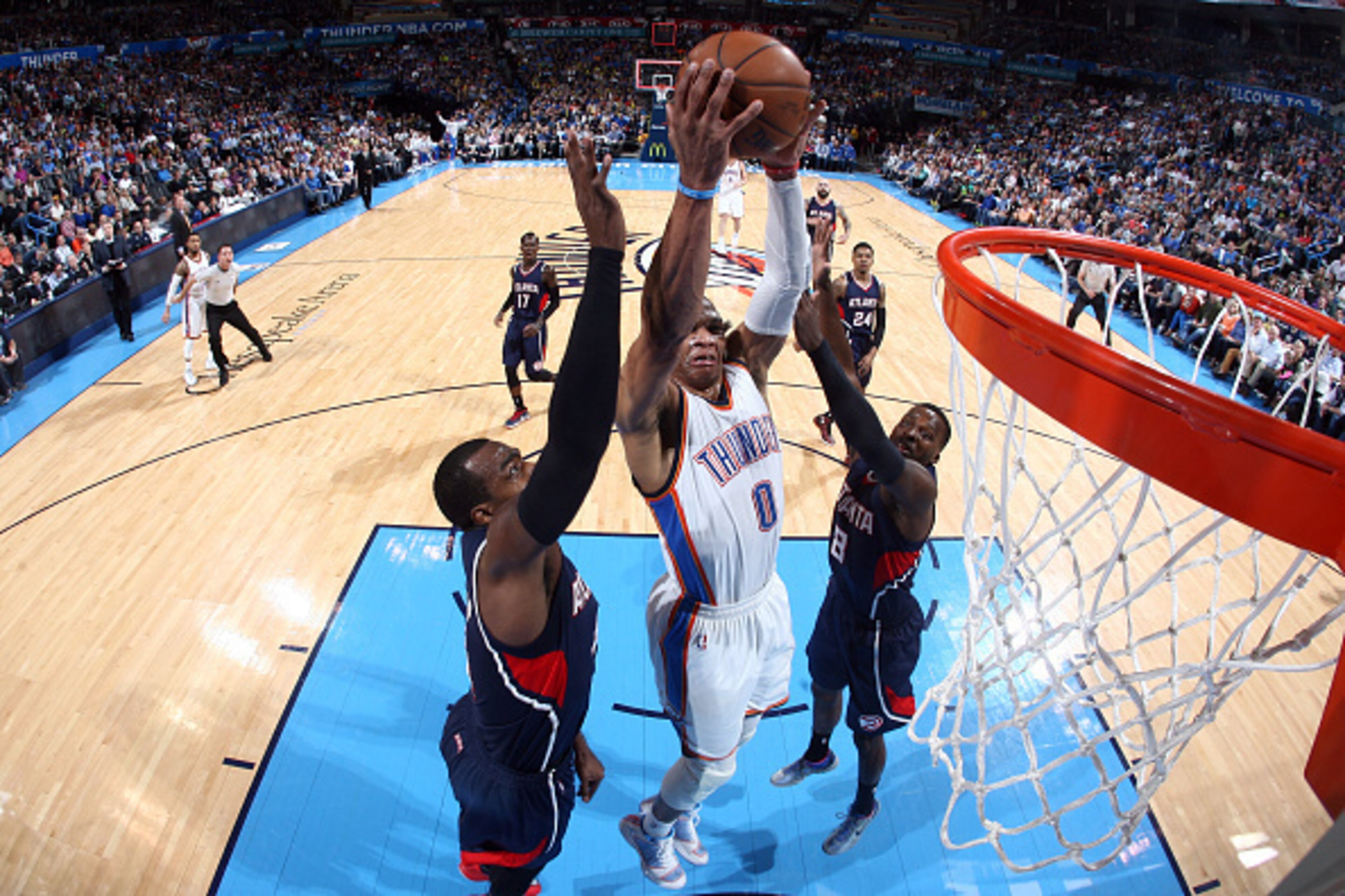 OKLAHOMA CITY, OK- March 20: Russell Westbrook #0 of the Oklahoma City Thunder dunks against the Atlanta Hawks on March 20, 2015 at Chesapeake Energy Arena in Oklahoma City, Oklahoma. NOTE TO USER: User expressly acknowledges and agrees that, by downloadi