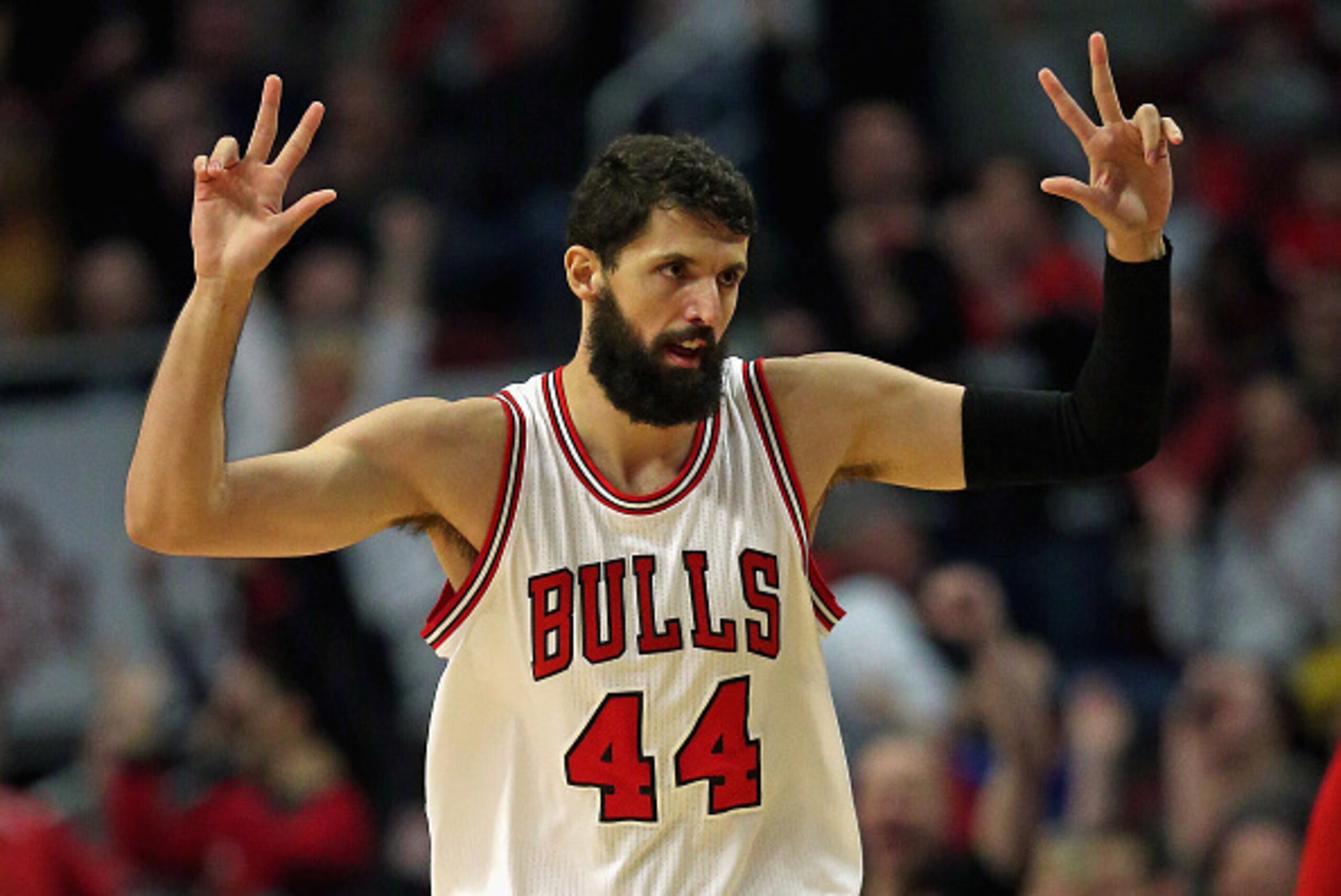 CHICAGO, IL - MARCH 20: Nikola Mirotic #44 of the Chicago Bulls holds up his fingers after hitting a three point shot against the Toronto Raptors at the United Center on March 20, 2015 in Chicago, Illinois. NOTE TO USER: User expressly acknowledges and ag