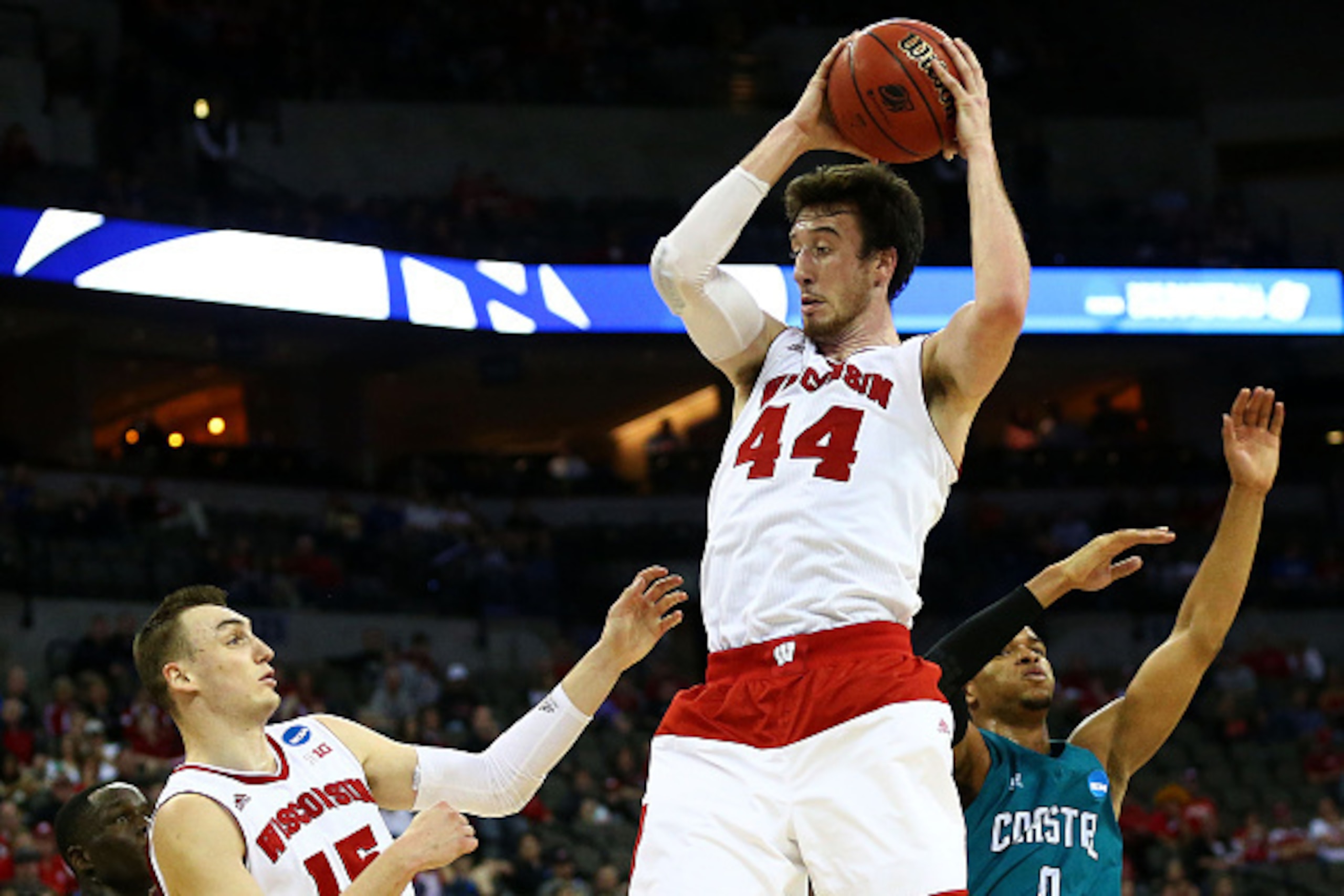 OMAHA, NE - MARCH 20:  Frank Kaminsky #44 of the Wisconsin Badgers rebounds in the second half against the Coastal Carolina Chanticleers during the second round of the 2015 NCAA Men's Basketball Tournament at the CenturyLink Center on March 20, 2015 in Om
