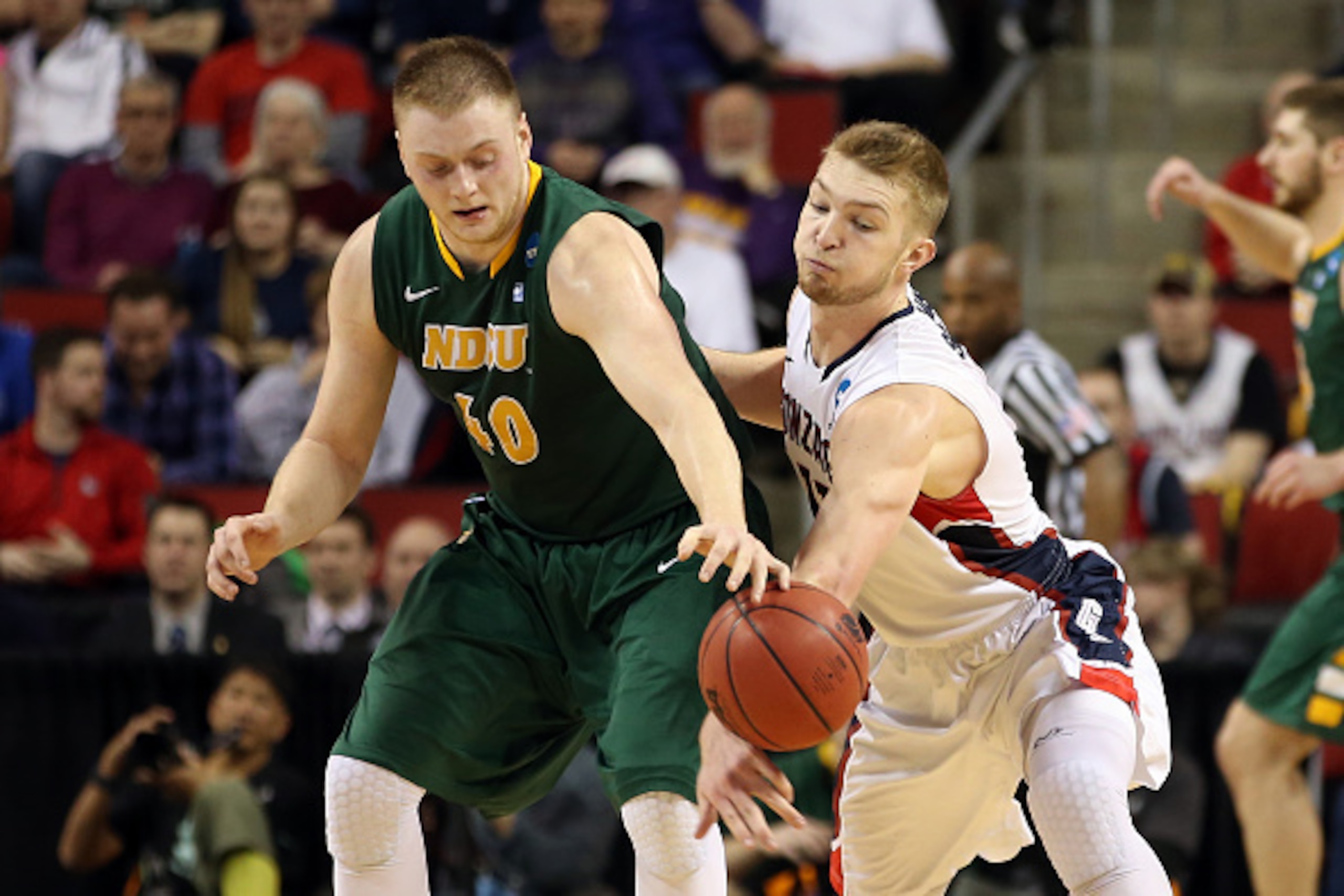 SEATTLE, WA - MARCH 20:  Domantas Sabonis #11 of the Gonzaga Bulldogs attempts to steal the ball from Dexter Werner #40 of the North Dakota State Bison in the second half of the game during the second round of the 2015 NCAA Men's Basketball Tournament at 