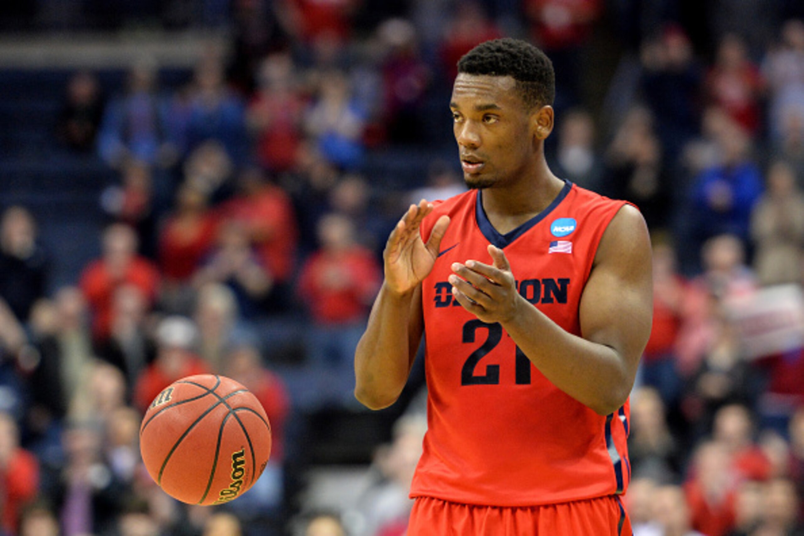 COLUMBUS, OH - MARCH 20: Dyshawn Pierre #21 of the Dayton Flyers celebrates during the closing moments of the Flyers 66-53 win over the Providence Friars during the second round of the 2015 NCAA Men's Basketball Tournament at Nationwide Arena on March 20,