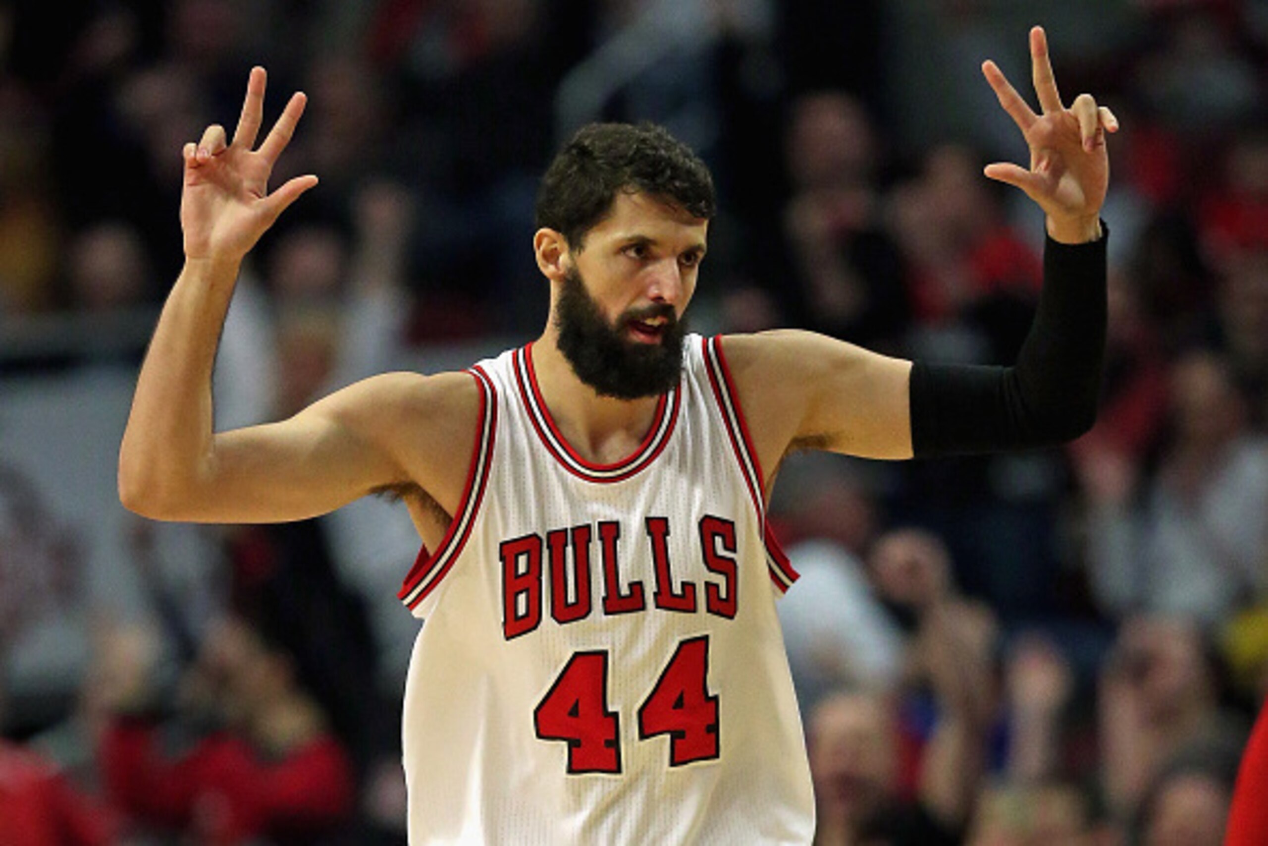 CHICAGO, IL - MARCH 20: Nikola Mirotic #44 of the Chicago Bulls holds up his fingers after hitting a three point shot against the Toronto Raptors at the United Center on March 20, 2015 in Chicago, Illinois. NOTE TO USER: User expressly acknowledges and ag