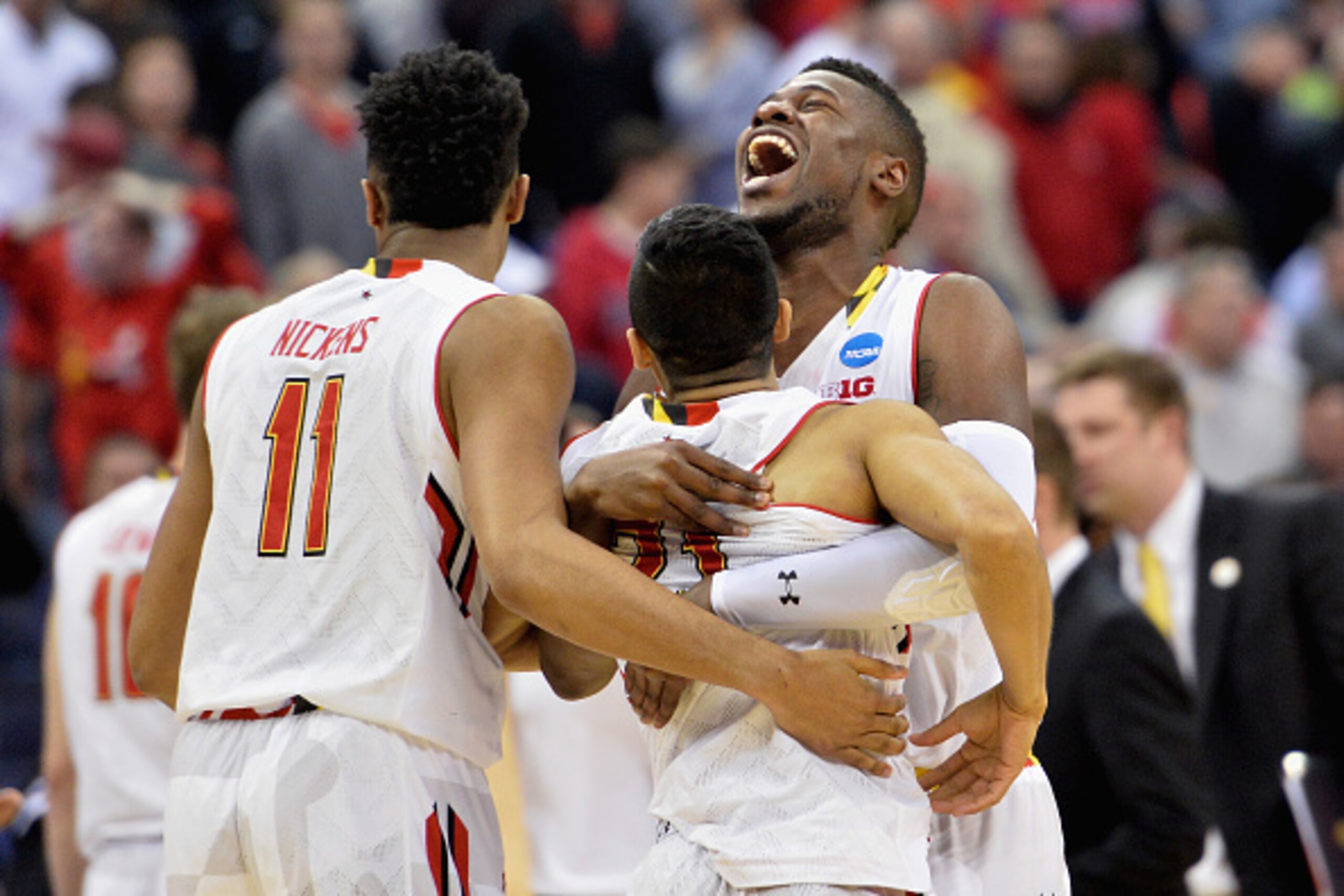 COLUMBUS, OH - MARCH 20:  Jonathan Graham #25 (R) and Varun Ram #21 of the Maryland Terrapins react after defeating the Valparaiso Crusaders during the second round of the Men's NCAA Basketball Tournament at Nationwide Arena on March 20, 2015 in Columbus,