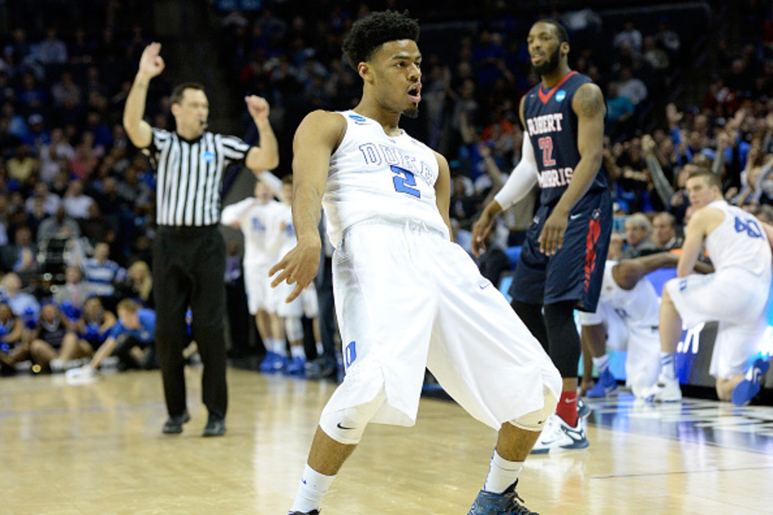 CHARLOTTE, NC - MARCH 20:  Quinn Cook #2 of the Duke Blue Devils reacts after a play against the Robert Morris Colonials during the second round of the 2015 NCAA Men's Basketball Tournament at Time Warner Cable Arena on March 20, 2015 in Charlotte, North 