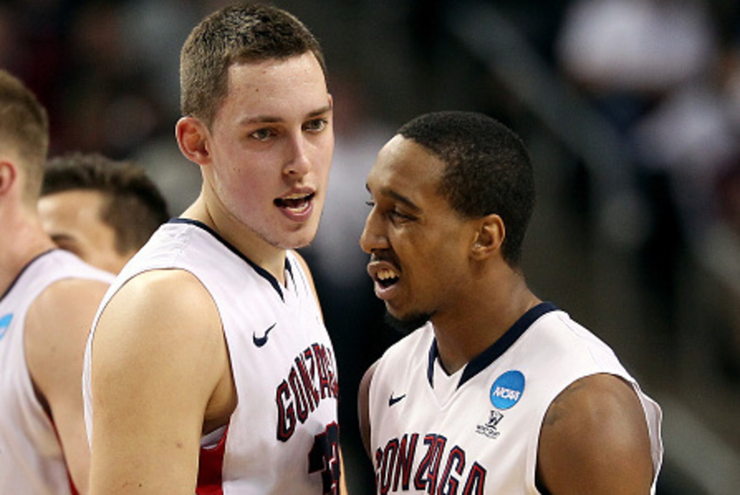 SEATTLE, WA - MARCH 20:  Kyle Wiltjer #33 of the Gonzaga Bulldogs talks with Eric McClellan #21 in the first half of the game against the North Dakota State Bison during the second round of the 2015 NCAA Men's Basketball Tournament at KeyArena on March 20