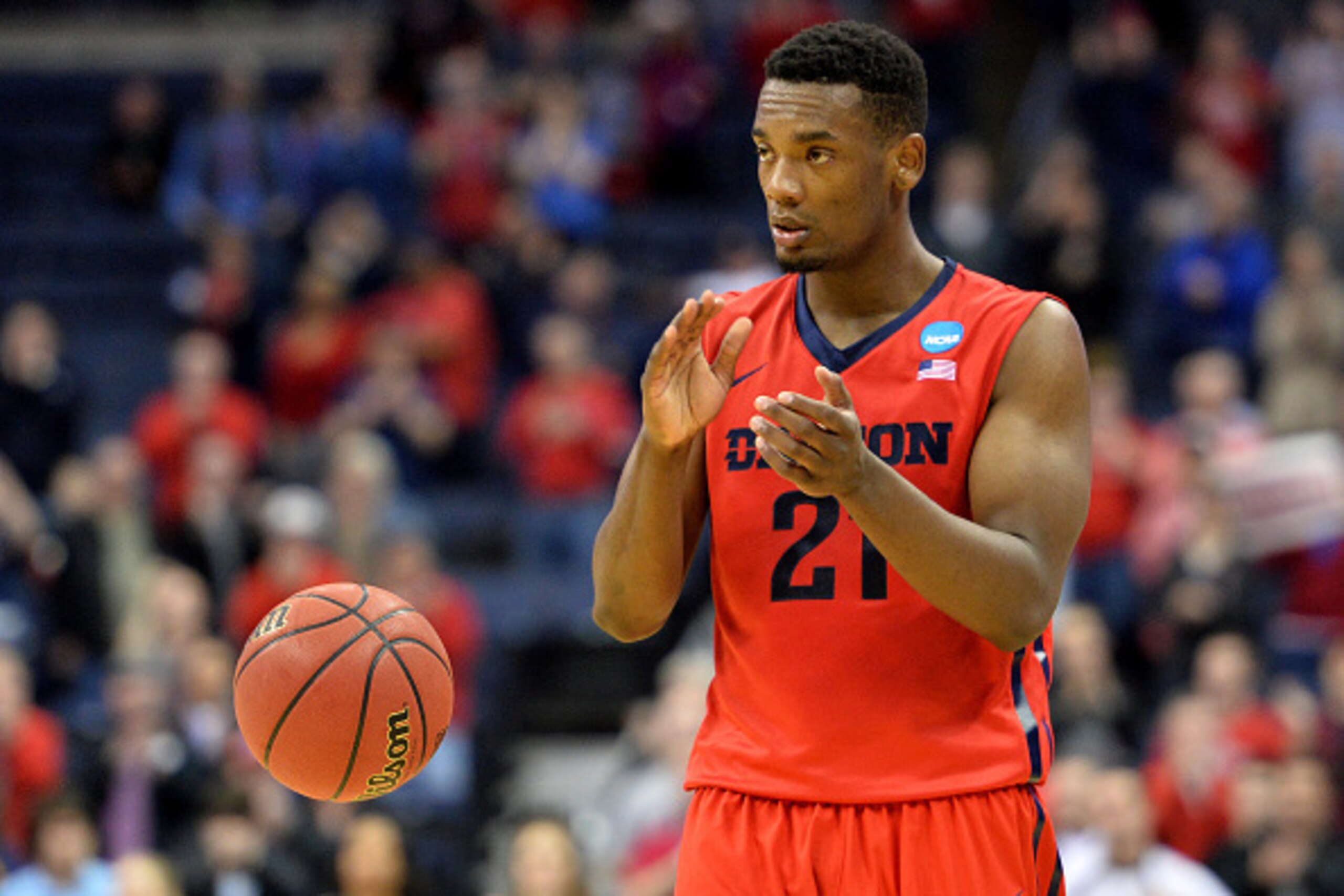 COLUMBUS, OH - MARCH 20: Dyshawn Pierre #21 of the Dayton Flyers celebrates during the closing moments of the Flyers 66-53 win over the Providence Friars during the second round of the 2015 NCAA Men's Basketball Tournament at Nationwide Arena on March 20,