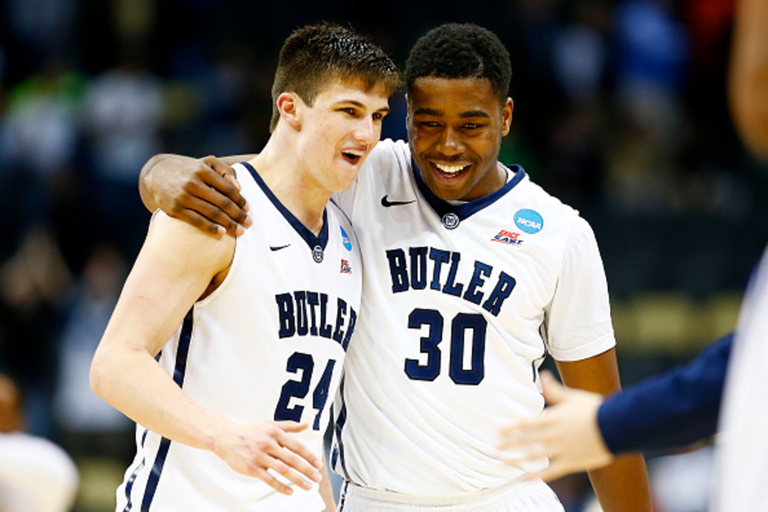 PITTSBURGH, PA - MARCH 19:  Kellen Dunham #24 and Kelan Martin #30 of the Butler Bulldogs celebrate their 56 to 48 win over the Texas Longhorns during the second round of the 2015 NCAA Men's Basketball Tournament at Consol Energy Center on March 19, 2015 