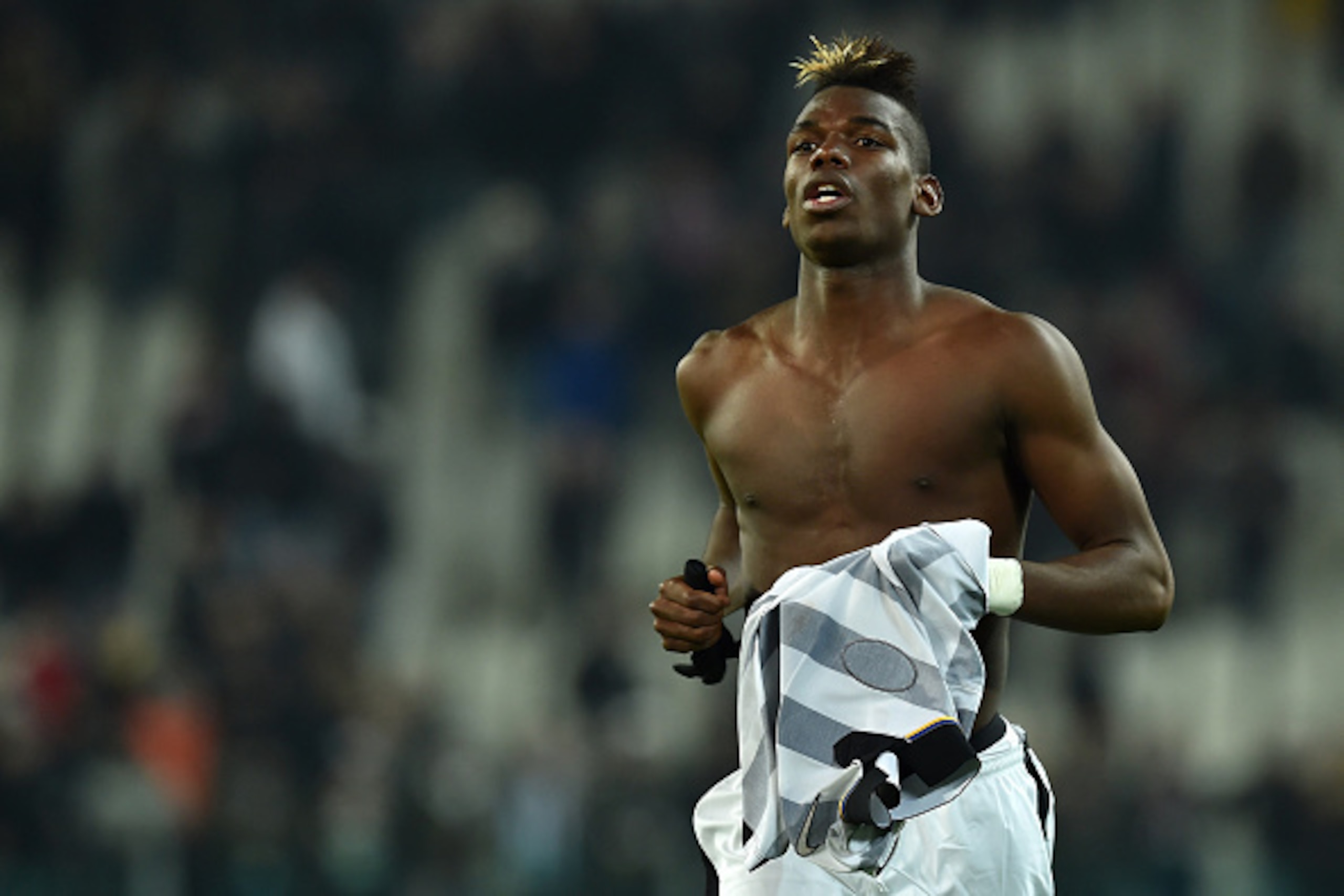 TURIN, ITALY - MARCH 09:  Paul Pogba of Juventus FC celebrates the victory at the end of the Serie A match between Juventus FC and US Sassuolo Calcio at Juventus Arena on March 9, 2015 in Turin, Italy.  (Photo by Valerio Pennicino/Getty Images)