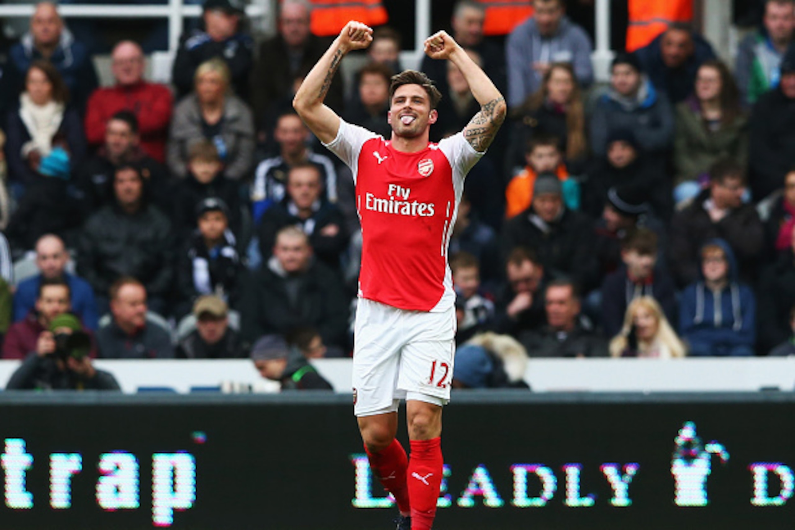 NEWCASTLE UPON TYNE, ENGLAND - MARCH 21: Olivier Giroud of Arsenal celebrates scoring his opening goal during the Barclays Premier League match between Newcastle United and Arsenal at St James' Park on March 21, 2015 in Newcastle upon Tyne, England.  (Pho